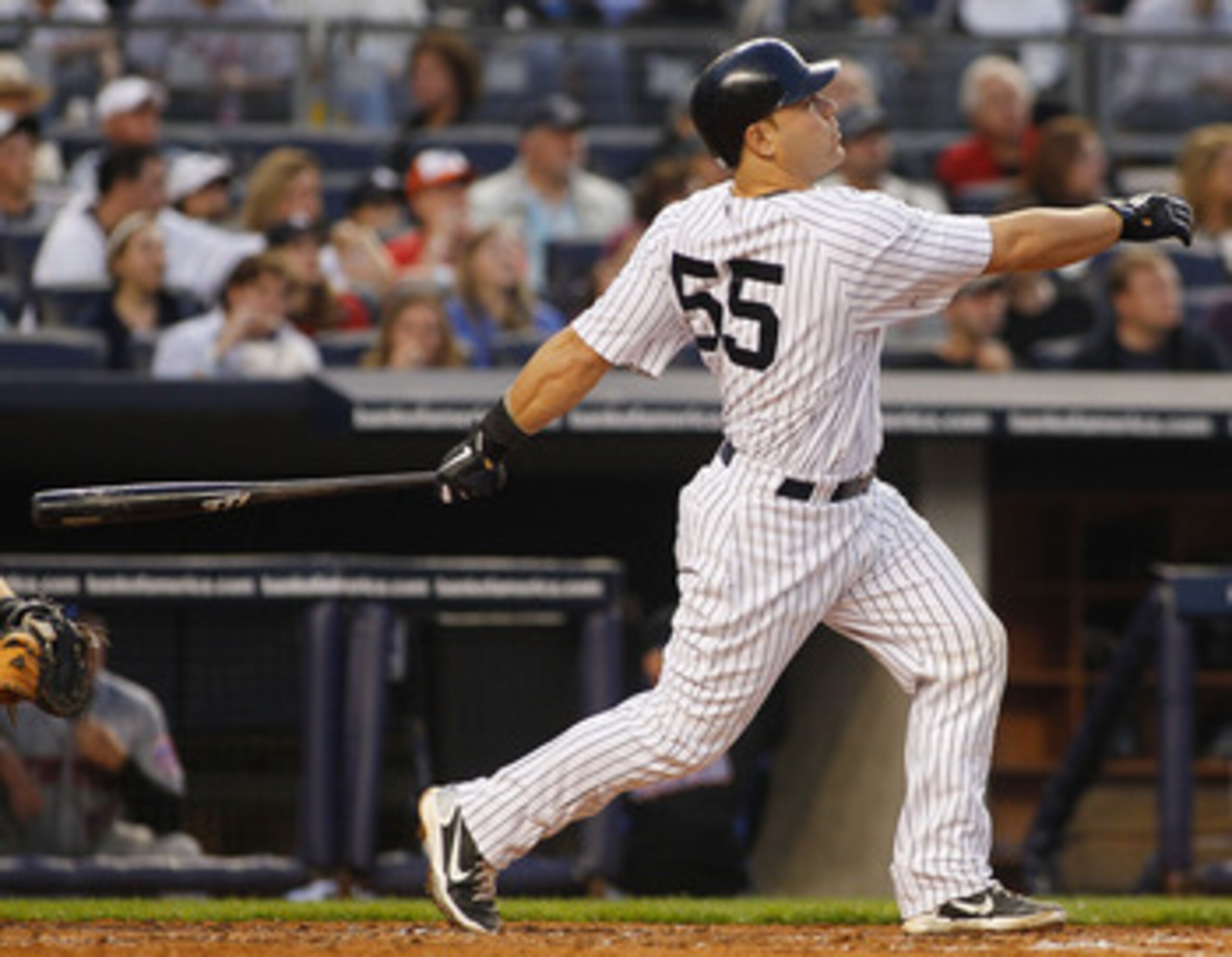 NEW YORK - MAY 21:  Russell Martin #55 of the New York Yankees watches his two run home run in the bottom of the second inning against the New York Mets on May 21, 2011 at Yankee Stadium in the Bronx borough of New York City.  (Photo by Mike Stobe/Getty I