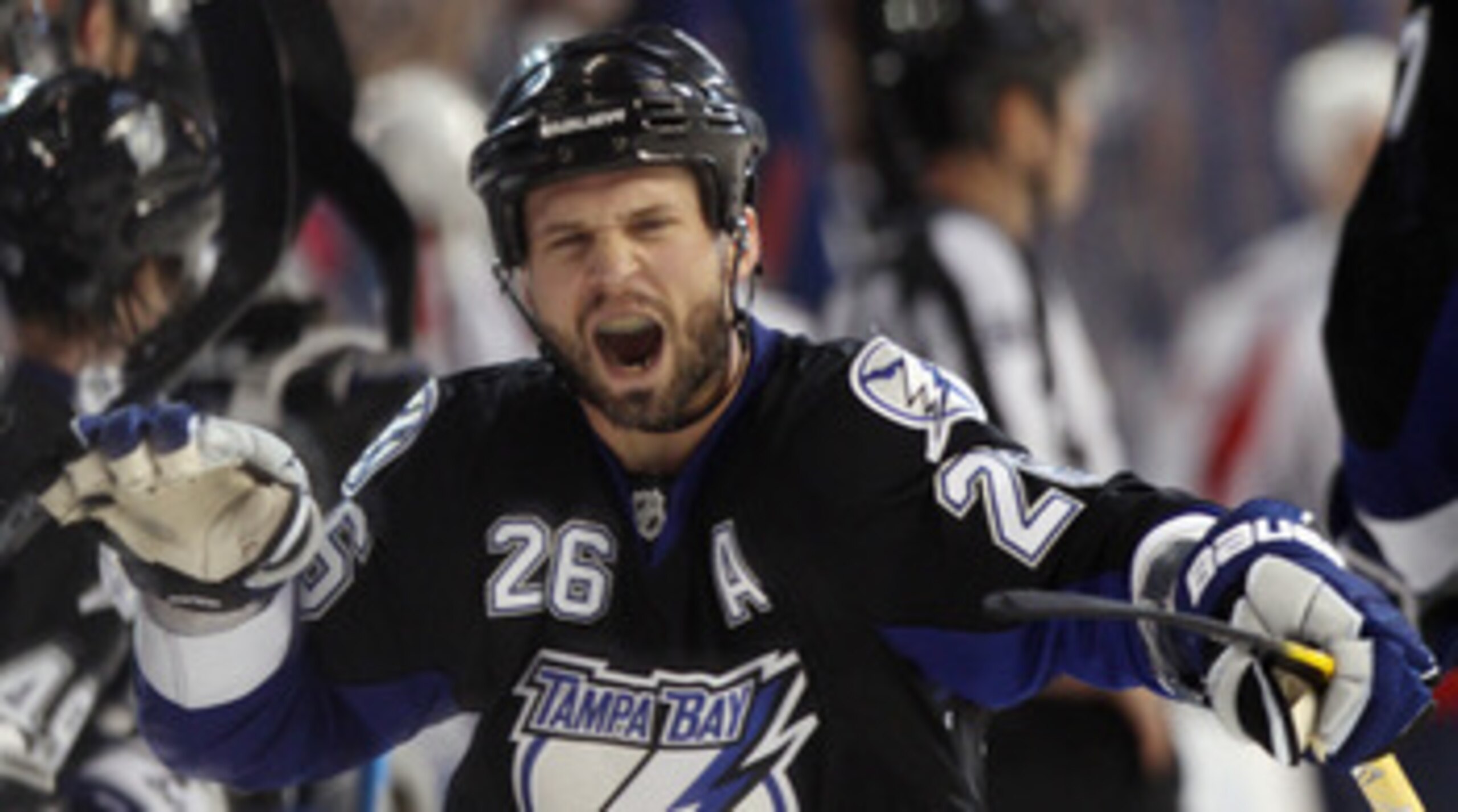 TAMPA, FL - MAY 04:  Martin St. Louis #26 of the Tampa Bay Lightning celebrates his goal at 16:52 of the third period against the Washington Capitals in Game Four of the Eastern Conference Semifinals during the 2011 NHL Stanley Cup Playoffs at the St Pete
