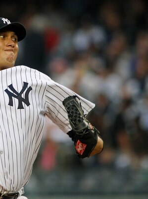 NEW YORK - MAY 20:  Freddy Garcia #36 of the New York Yankees delivers a pitch in the first inning against the New York Mets on May 20, 2011 at Yankee Stadium in the Bronx borough of New York City.  (Photo by Mike Stobe/Getty Images)