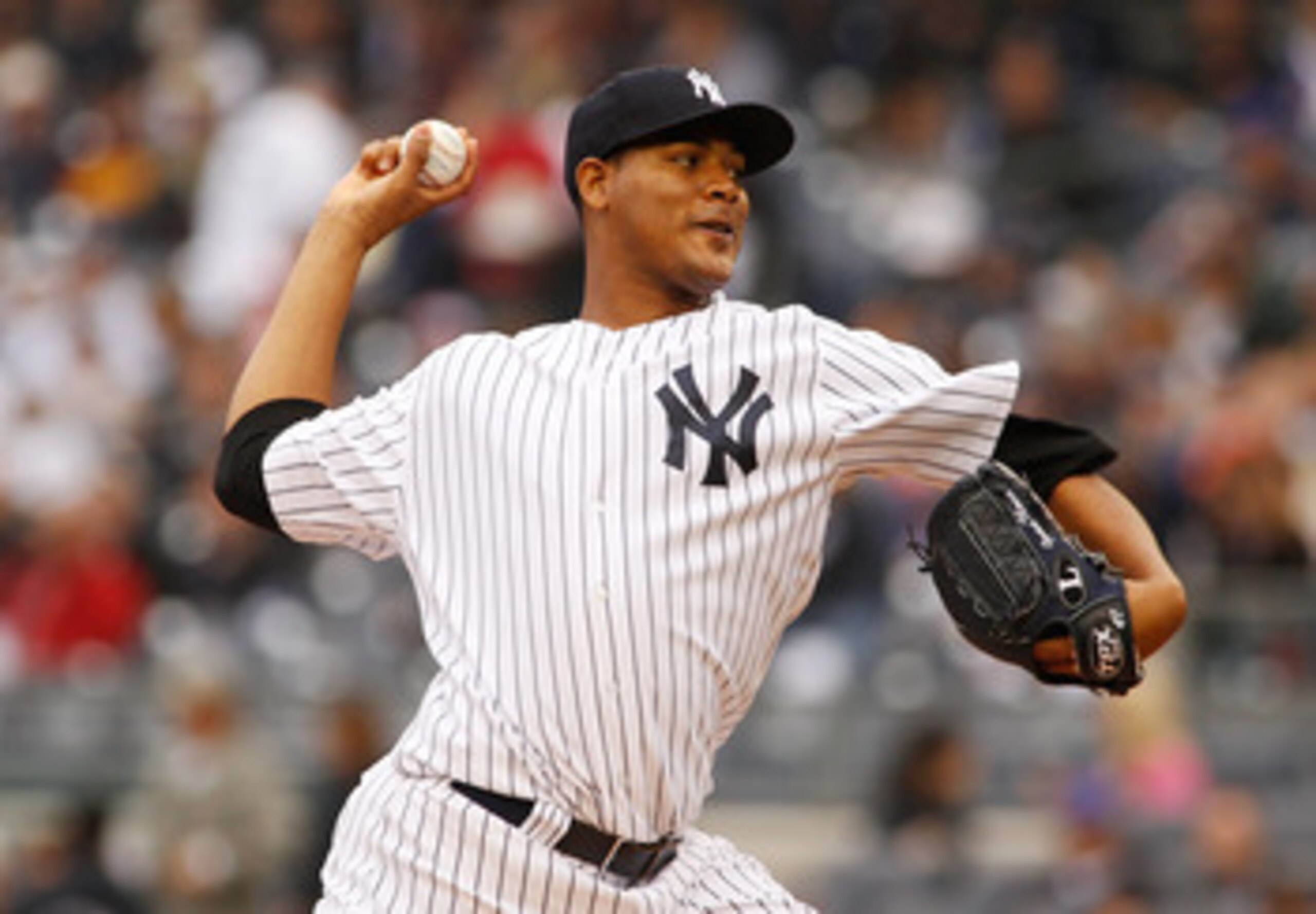 NEW YORK - MAY 22:  Ivan Nova #47 of the New York Yankees delivers a pitch in the first inning against the New York Mets on May 22, 2011 at Yankee Stadium in the Bronx borough of New York City.  (Photo by Mike Stobe/Getty Images)