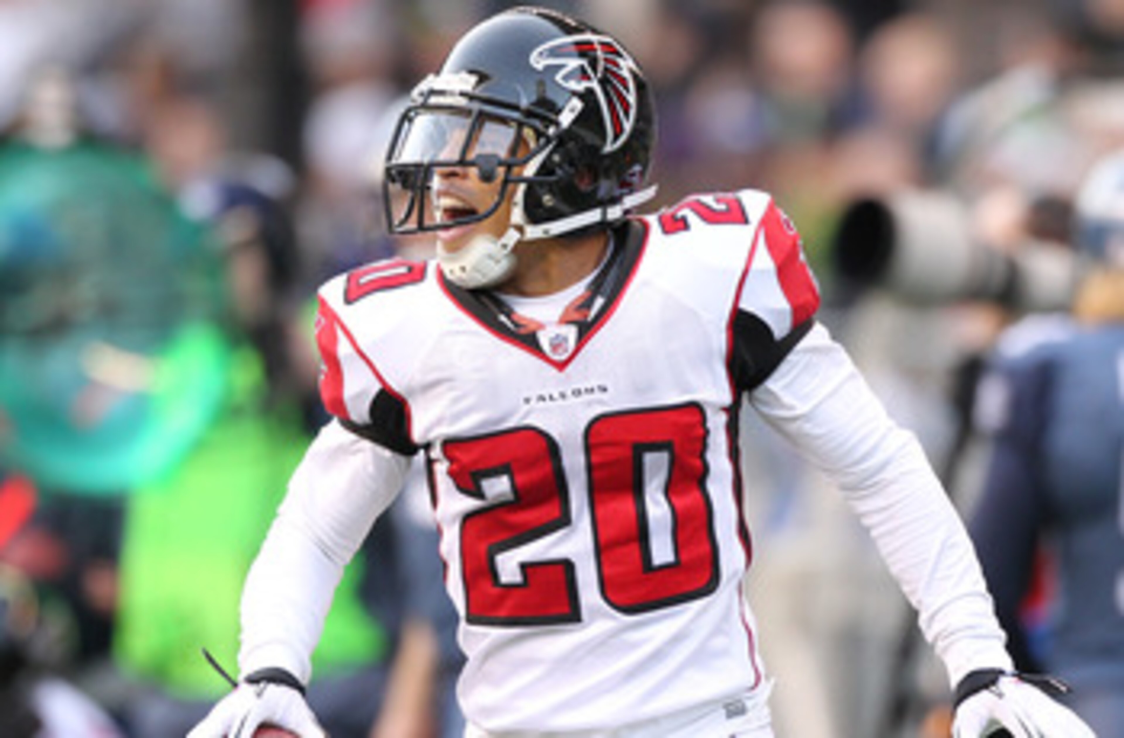 SEATTLE, WA - DECEMBER 19:  Brent Grimes #20 of the Atlanta Falcons celebrates after making an interception against the Seattle Seahawks at Qwest Field on December 19, 2010 in Seattle, Washington. The Falcons defeated the Seahawks 34-18. (Photo by Otto Gr