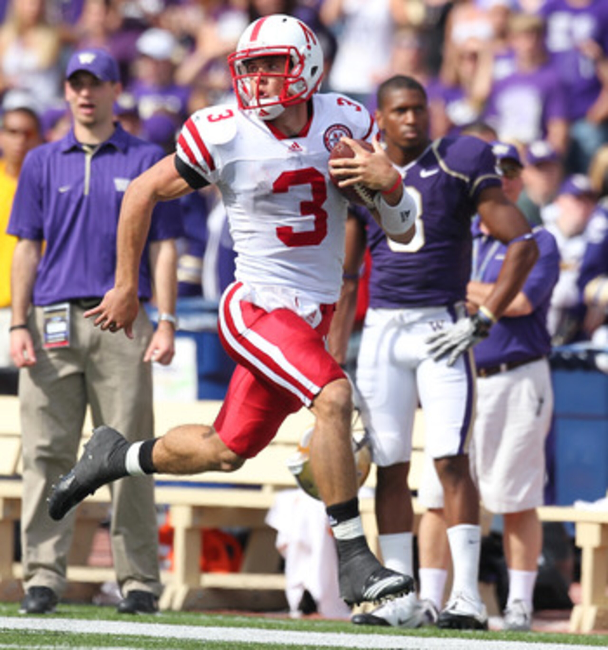 SEATTLE - SEPTEMBER 18: Quarterback Taylor Martinez #3 of the Nebraska Cornhuskers rushes for an 80 yard touchdown run in the third quarter against the Washington Huskies on September 18, 2010 at Husky Stadium in Seattle, Washington. The Cornhuskers defea