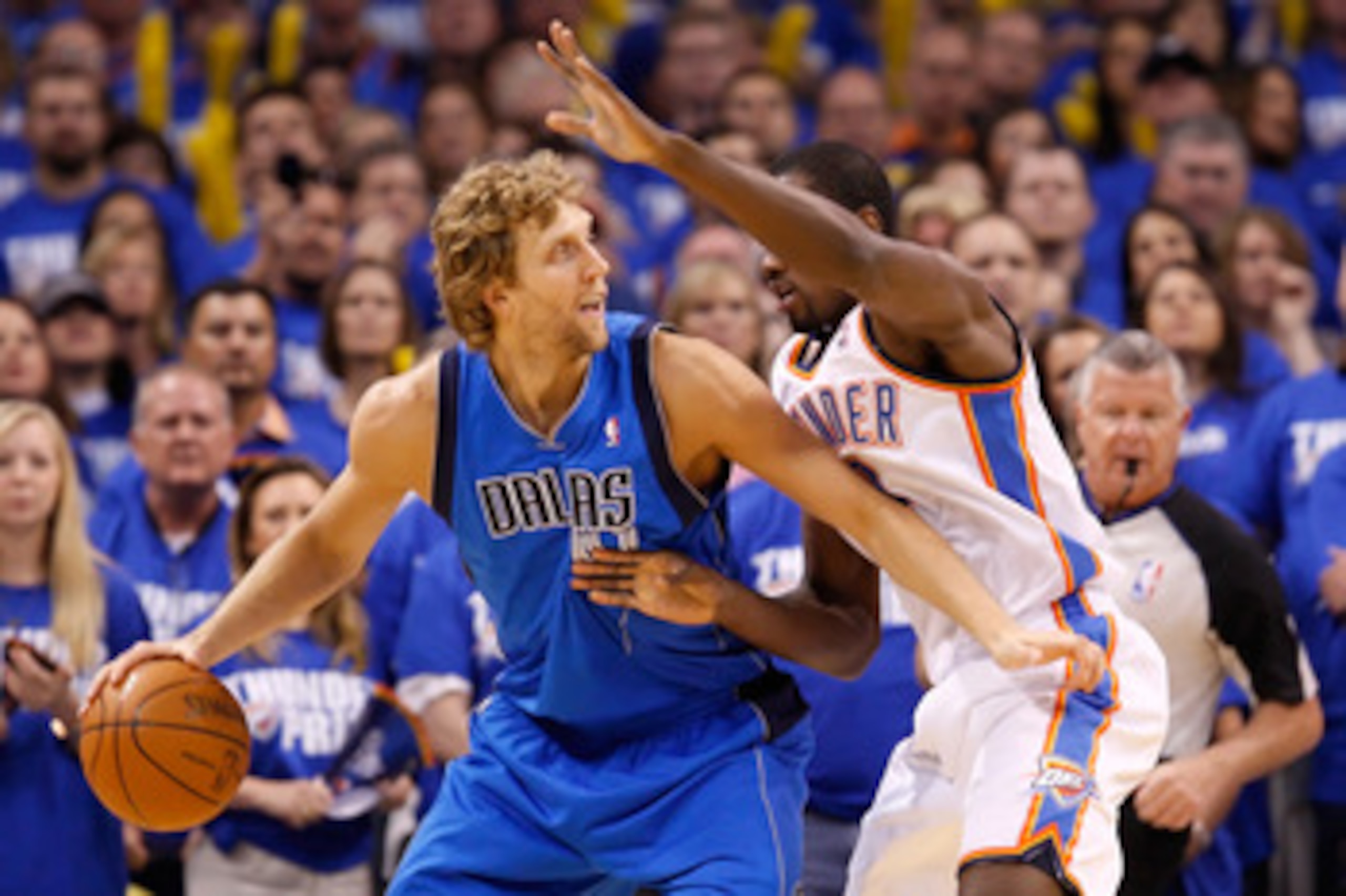 OKLAHOMA CITY, OK - MAY 21:  Dirk Nowitzki #41 of the Dallas Mavericks posts up Serge Ibaka #9 of the Oklahoma City Thunder in the first quarter in Game Three of the Western Conference Finals during the 2011 NBA Playoffs at Oklahoma City Arena on May 21,