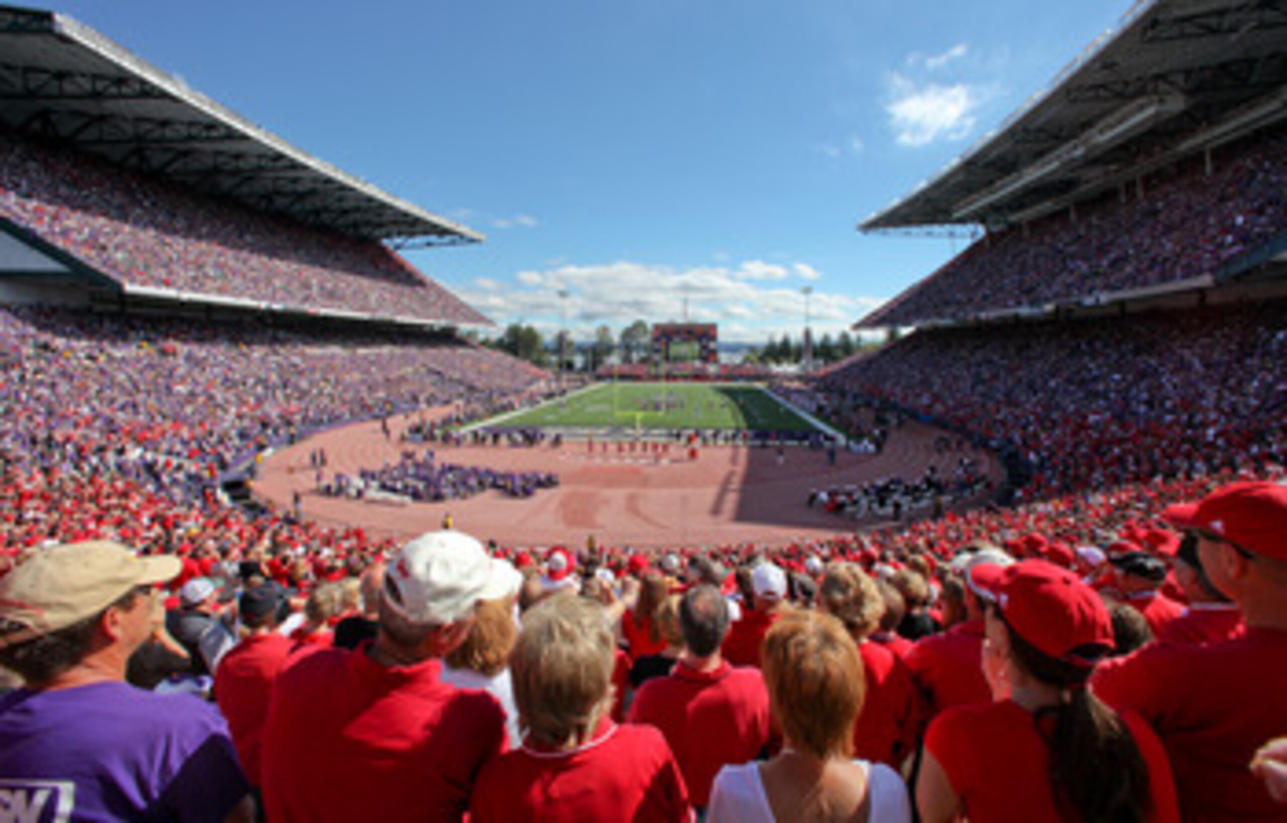 SEATTLE - SEPTEMBER 18: Fans of the Nebraska Cornhuskers watch the game against the Washington Huskies on September 18, 2010 at Husky Stadium in Seattle, Washington. The Cornhuskers defeated the Huskies 56-21.(Photo by Otto Greule Jr/Getty Images)
