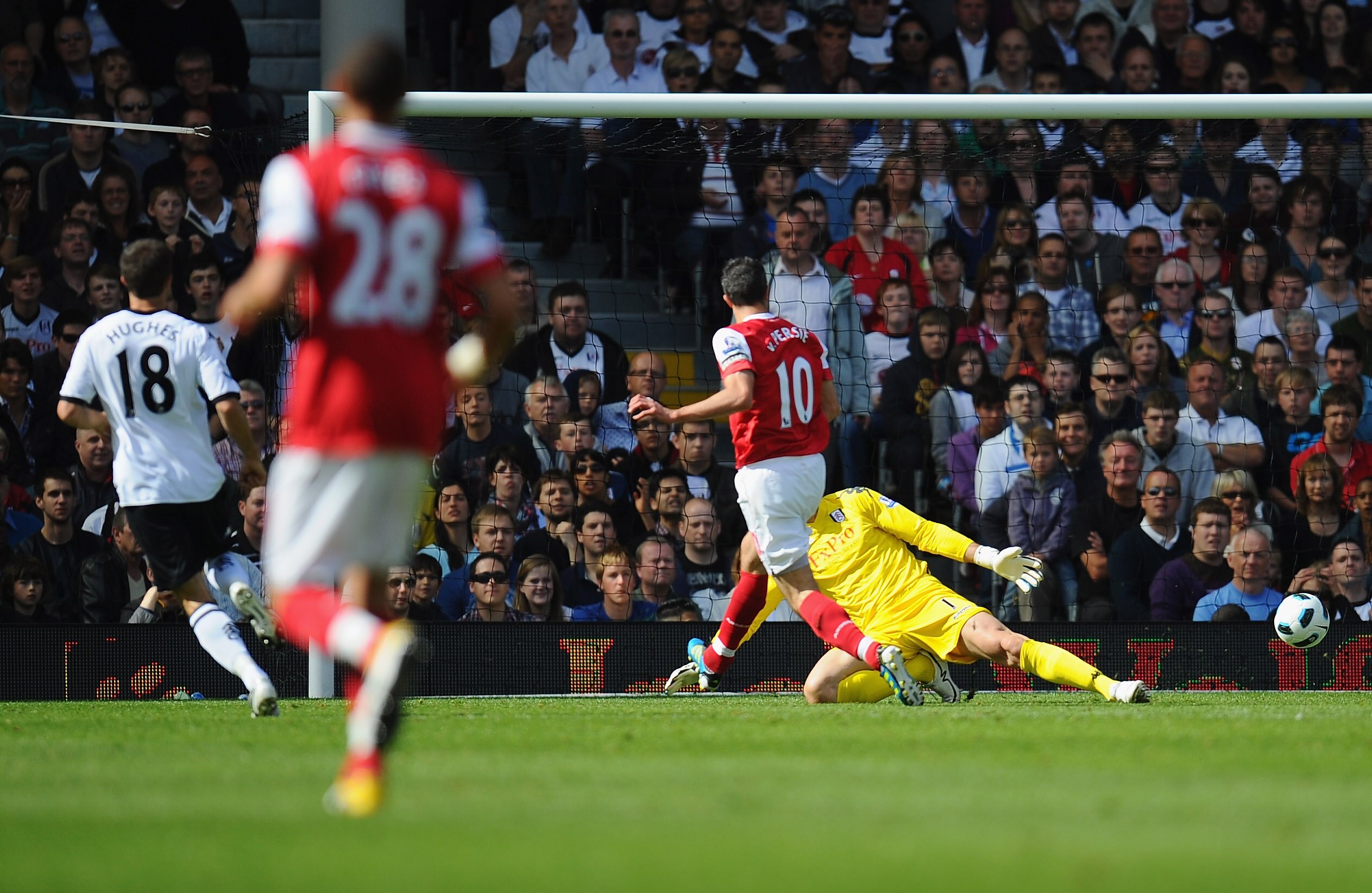 LONDON, ENGLAND - MAY 22:   Robin Van Persie of Arsenal scores during the Barclays Premier League match between Fulham and Arsenal at Craven Cottage on May 22, 2011 in London, England.  (Photo by Clive Mason/Getty Images)