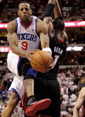 PHILADELPHIA, PA - APRIL 21: Andre Iguodala #9 of the Philadelphia 76ers drives to the basket against Chris Bosh #1 of the Miami Heat during the second half of game three of the Eastern Conference Quarterfinals at Wells Fargo Center on April 21, 2011 in P PHILADELPHIA, PA - APRIL 21: Andre Iguodala #9 of the Philadelphia 76ers drives to the basket against Chris Bosh #1 of the Miami Heat during the second half of game three of the Eastern Conference Quarterfinals at Wells Fargo Center on April 21, 2011 in P