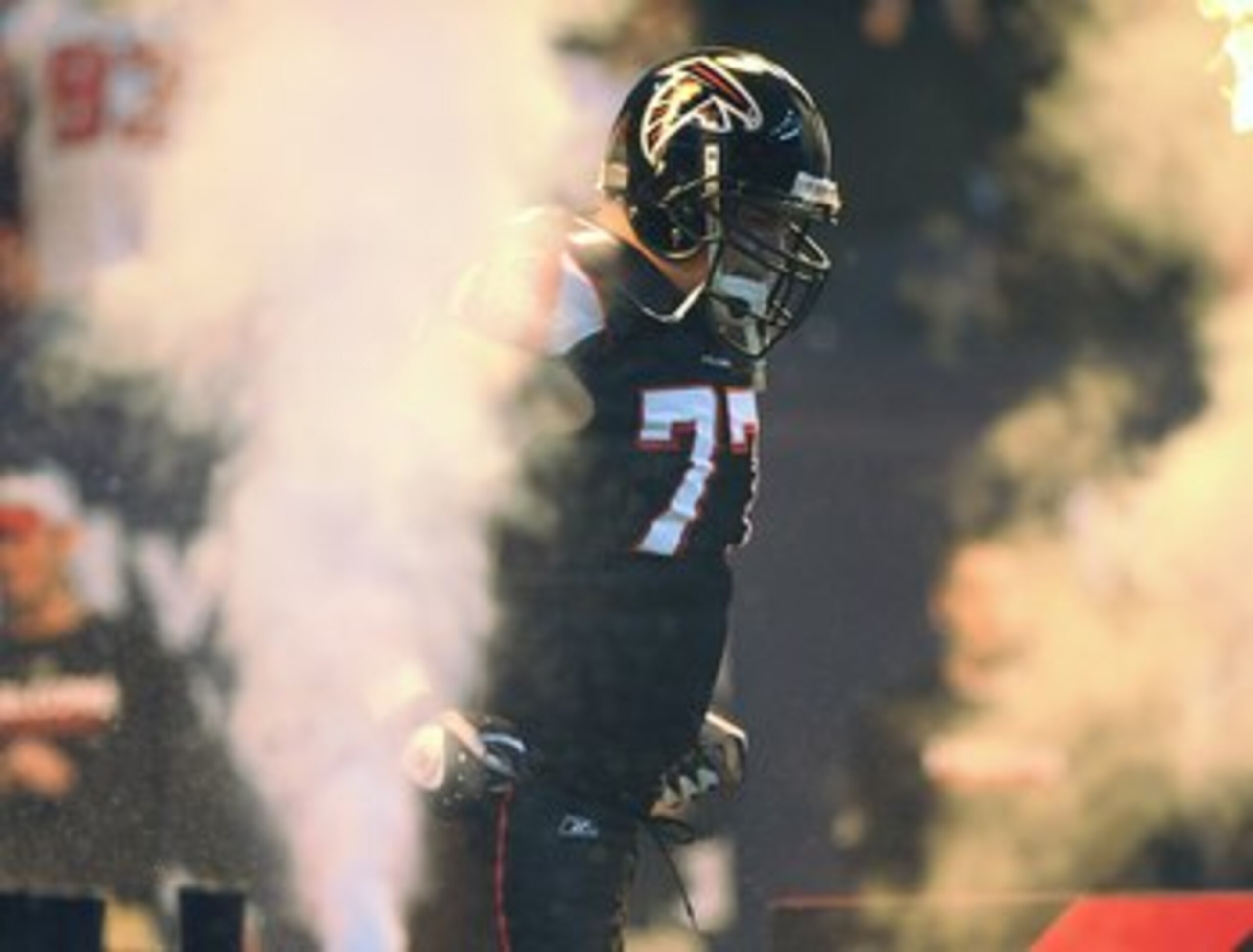 ATLANTA - NOVEMBER 23: Tackle Tyson Clabo #77 of the Atlanta Falcons enters the field before play against the Carolina Panthers at the Georgia Dome on November 23, 2008 in Atlanta, Georgia.  (Photo by Al Messerschmidt/Getty Images)