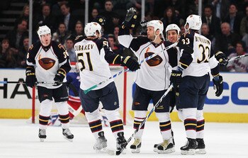 NEW YORK, NY - APRIL 07:  Rob Schremp #13 of the Atlanta Thrashers celebrates his goal against the New York Rangers during their game on April 7, 2011 at Madison Square Garden in New York City, New York.  (Photo by Al Bello/Getty Images)
