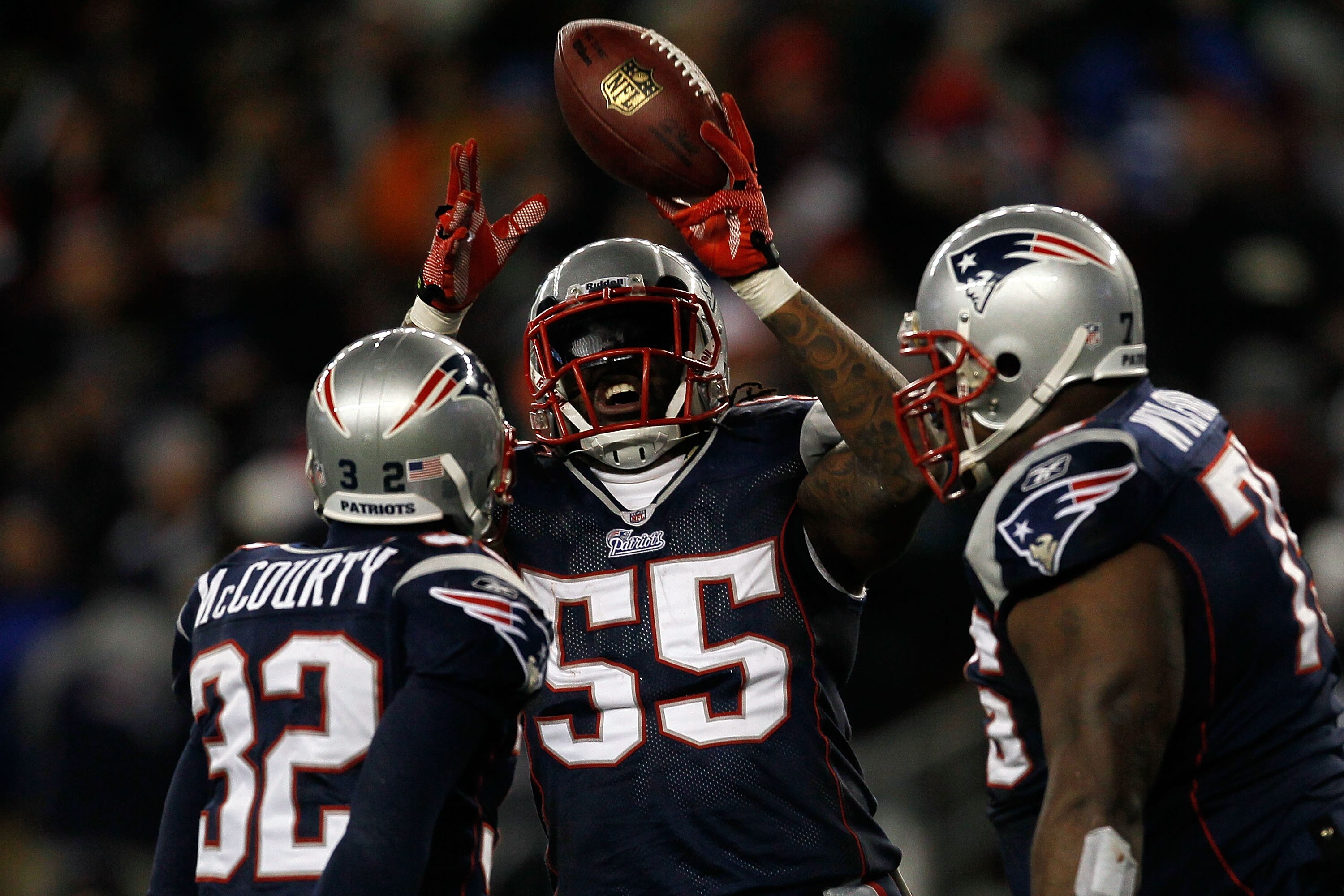 FOXBORO, MA - DECEMBER 06:  (L-R) Devin McCourty #32, Brandon Spikes #55 and Vince Wilfork #75 of the New England Patriots celebrate after McCourty intercepted a pass in the third quarter against the New York Jets at Gillette Stadium on December 6, 2010 i