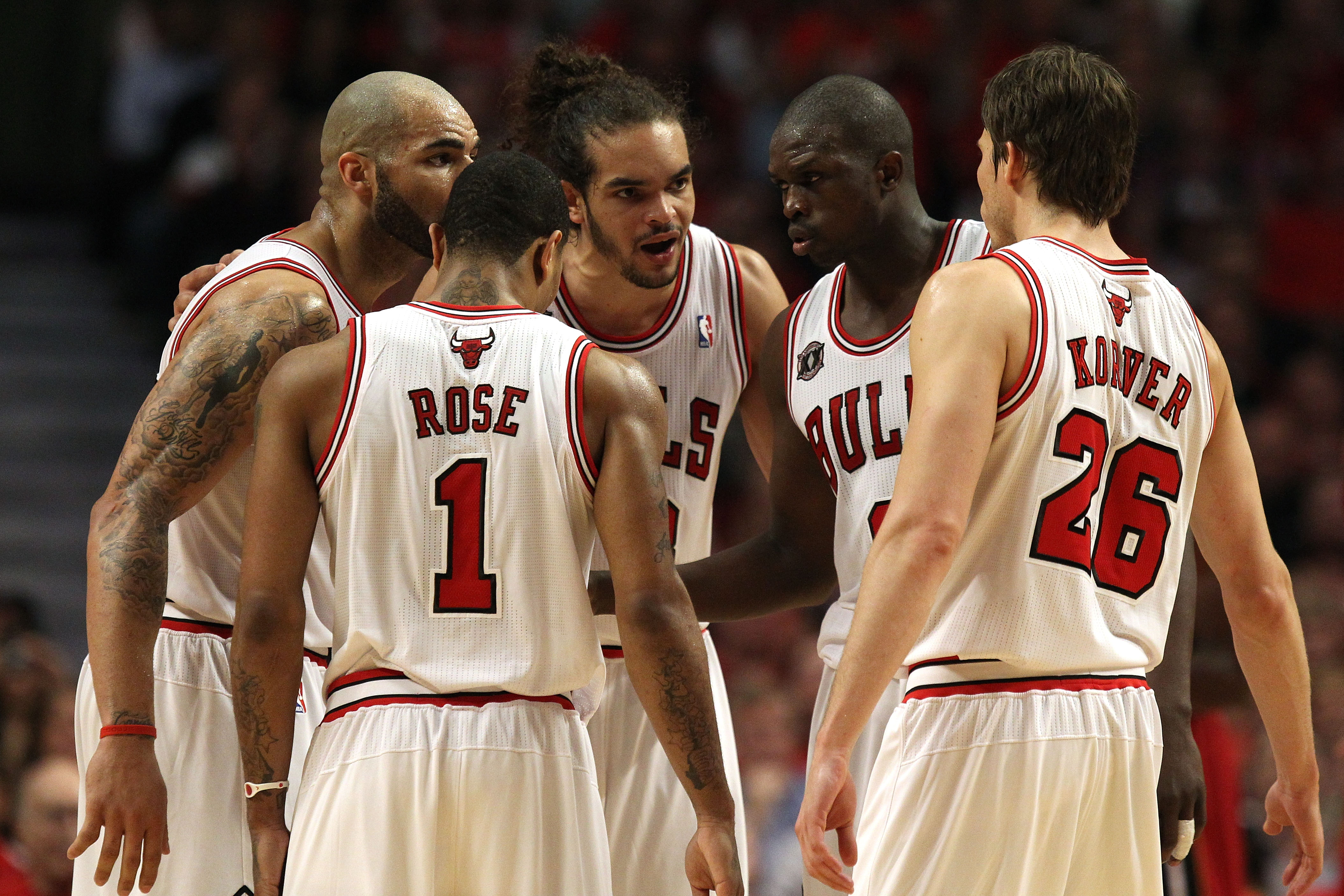CHICAGO, IL - MAY 18:  (L-R) Carlos Boozer #5, Derrick Rose #1, Joakim Noah #13, Luol Deng #9 and Kyle Korver #26 of the Chicago Bulls huddle up against the Miami Heat in Game Two of the Eastern Conference Finals during the 2011 NBA Playoffs on May 18, 20
