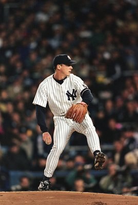 14 Oct 1999: David Cone #36 of the New York Yankees winds back to pitch the ball during the American League Championship Series game two against the Boston Red Sox at Yankee Stadium in the Bronx, New York. The Yankees defeated the Red Sox 3-2.