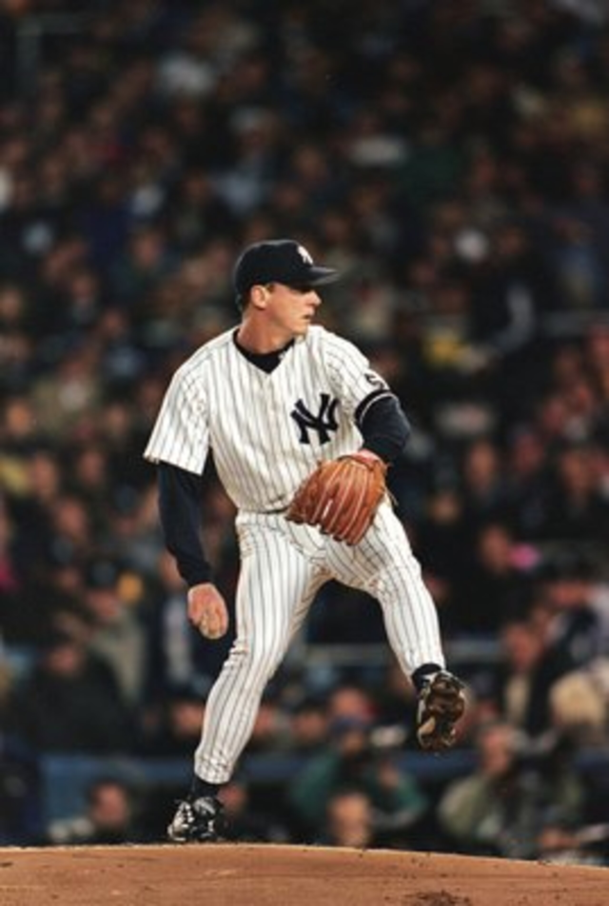 14 Oct 1999: David Cone #36 of the New York Yankees winds back to pitch the ball during the American League Championship Series game two against the Boston Red Sox at Yankee Stadium in the Bronx, New York. The Yankees defeated the Red Sox 3-2.