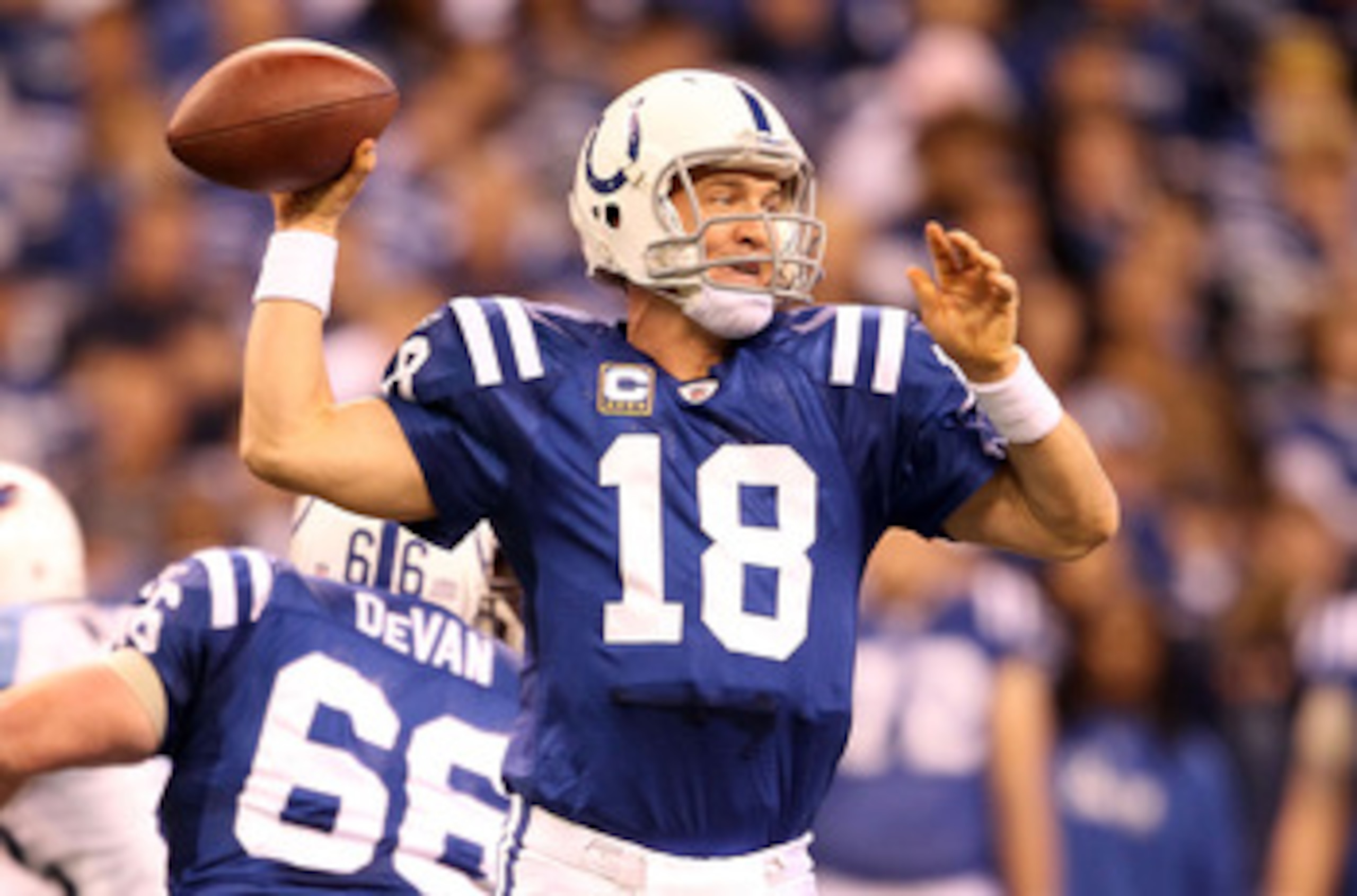 INDIANAPOLIS - JANUARY 02: Peyton Manning #18 of the Indianapolis Colts throws a pass during NFL game against the Tennessee Titans at Lucas Oil Stadium on January 2, 2011 in Indianapolis, Indiana.  (Photo by Andy Lyons/Getty Images)