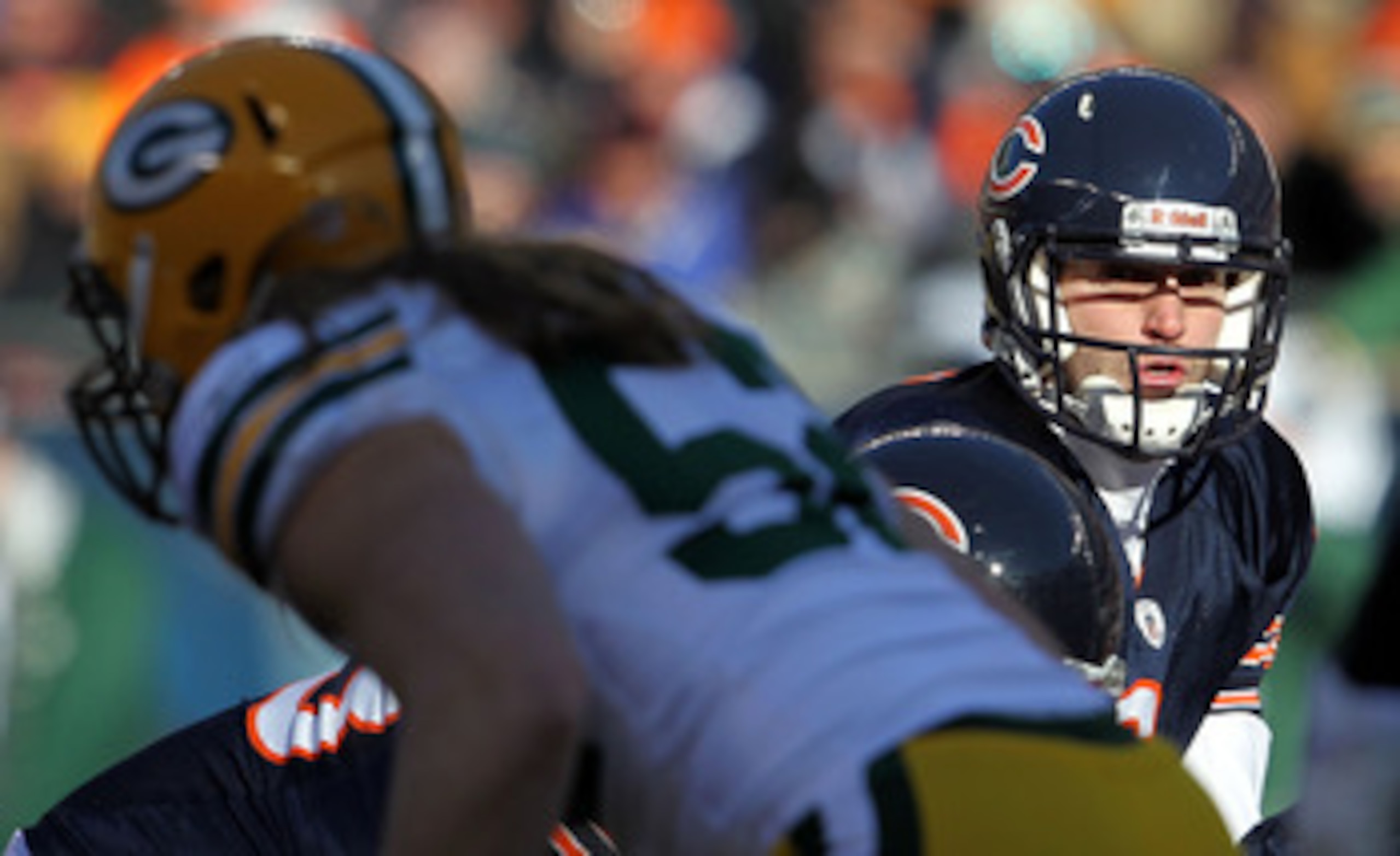 CHICAGO, IL - JANUARY 23:  Quarterback Jay Cutler #6 of the Chicago Bears looks on from under center while taking on the Green Bay Packers in the NFC Championship Game at Soldier Field on January 23, 2011 in Chicago, Illinois.  (Photo by Jamie Squire/Gett
