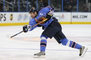 ATLANTA - FEBRUARY 06:  Ilya Kovalchuk #17 of the Atlanta Thrashers takes the shot against the New Jersey Devils on February 6, 2009 at the Philips Arena in Atlanta, Georgia.  (Photo by Bruce Bennett/Getty Images)