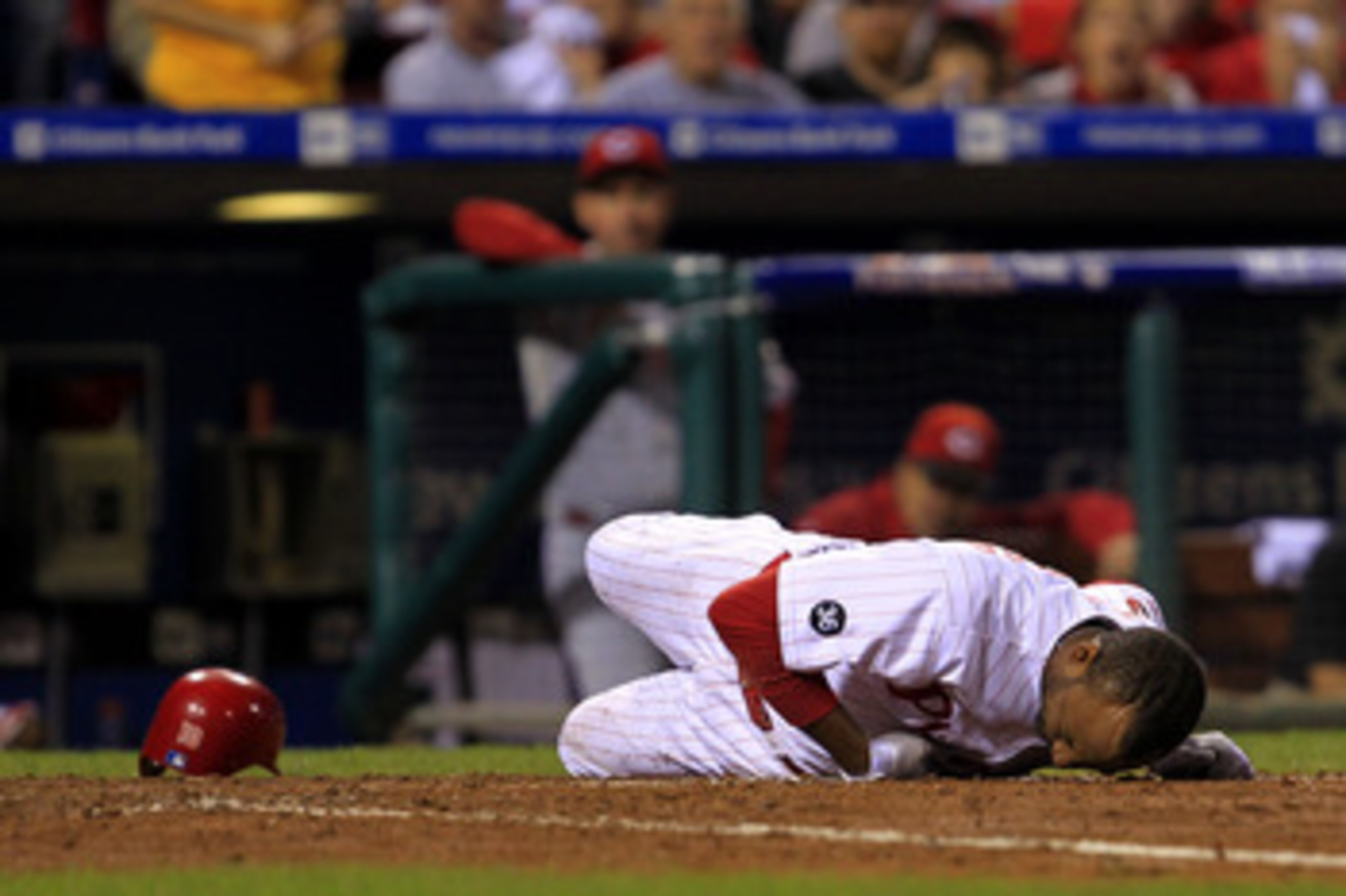PHILADELPHIA - OCTOBER 08:  Ben Francisco #10 of the Philadelphia Phillies is hit by a pitch in the sixth inning against the Cincinnati Reds in game 2 of NLDS at Citizens Bank Park on October 8, 2010 in Philadelphia, Pennsylvania. The Phillies defeated th