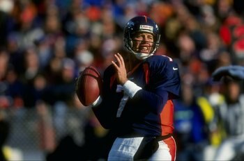 6 Dec 1998: Quarterback John Elway #7 of the Denver Broncos in action during the game against the Kansas City Chiefs at Mile High Stadium in Denver, Colorado. The Broncos defeated the Chiefs 35-31.
