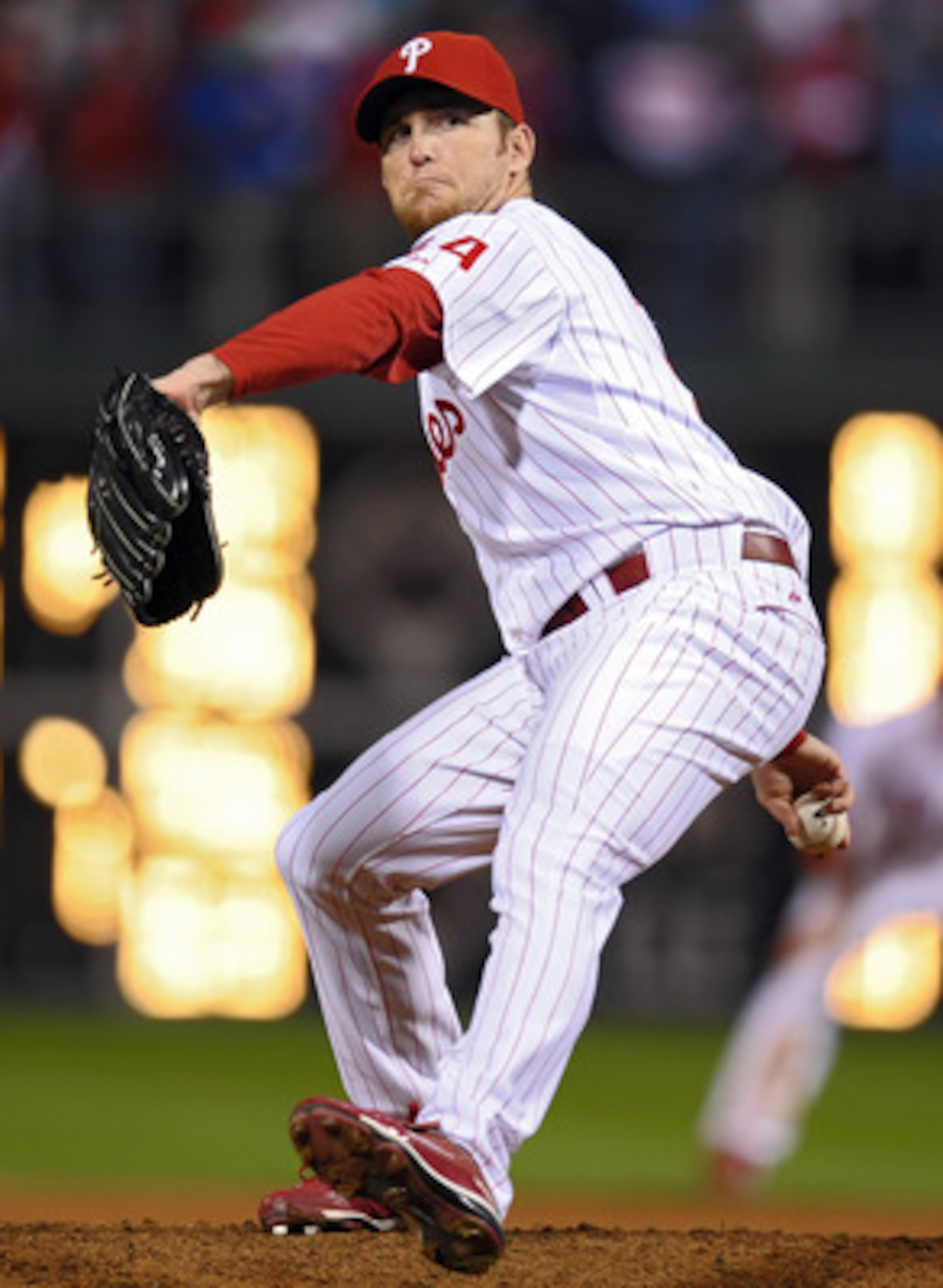 PHILADELPHIA - SEPTEMBER 30: Closing pitcher Brad Lidge #54 of the Philadelphia Phillies winds up on the last pitch of the game beating the Houston Astros 10-3 and winning the National League East on September 30, 2009 at Citizens Bank Park in Philadelphi