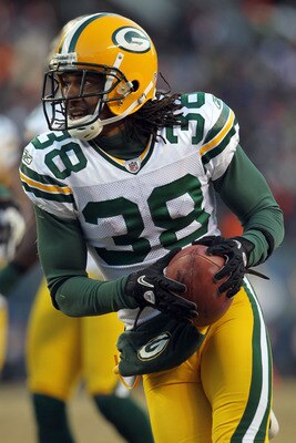 CHICAGO, IL - JANUARY 23:  Tramon Williams #38 of the Green Bay Packers returns a kick against the Chicago Bears in the NFC Championship Game at Soldier Field on January 23, 2011 in Chicago, Illinois.  (Photo by Jamie Squire/Getty Images)