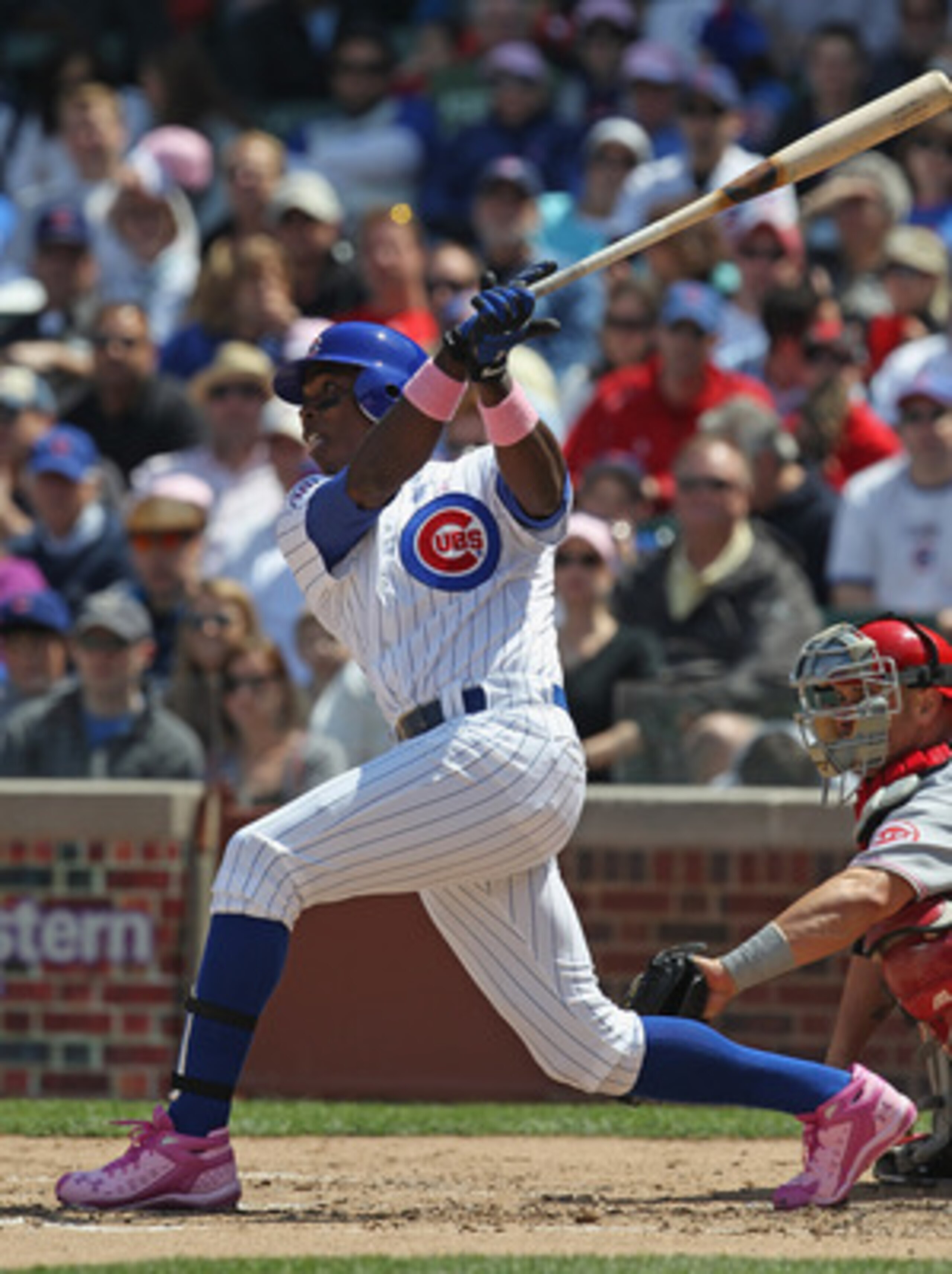 CHICAGO, IL - MAY 08: Alfonso Soriano #12 of the Chicago Cubs hits the ball against the Cincinnati Reds at Wrigley Field on May 8, 2011 in Chicago, Illinois. The Reds defeated the Cubs 2-0. (Photo by Jonathan Daniel/Getty Images)