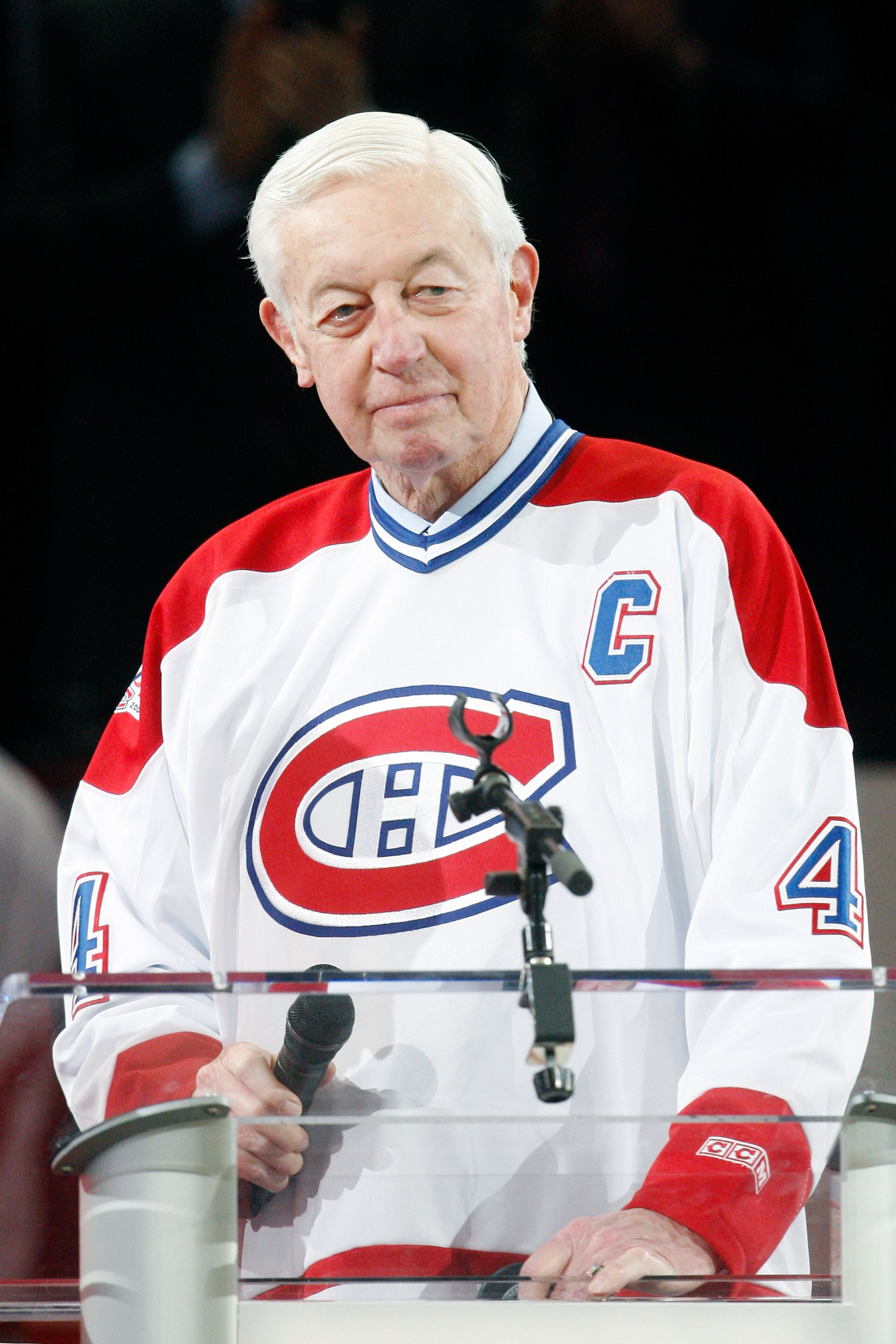 MONTREAL- DECEMBER 4: Former Montreal Canadien Jean Beliveau speaks to fans during the Centennial Celebration ceremonies prior to the NHL game between the Montreal Canadiens and Boston Bruins on December 4, 2009 at the Bell Centre in Montreal, Quebec, Ca MONTREAL- DECEMBER 4: Former Montreal Canadien Jean Beliveau speaks to fans during the Centennial Celebration ceremonies prior to the NHL game between the Montreal Canadiens and Boston Bruins on December 4, 2009 at the Bell Centre in Montreal, Quebec, Ca