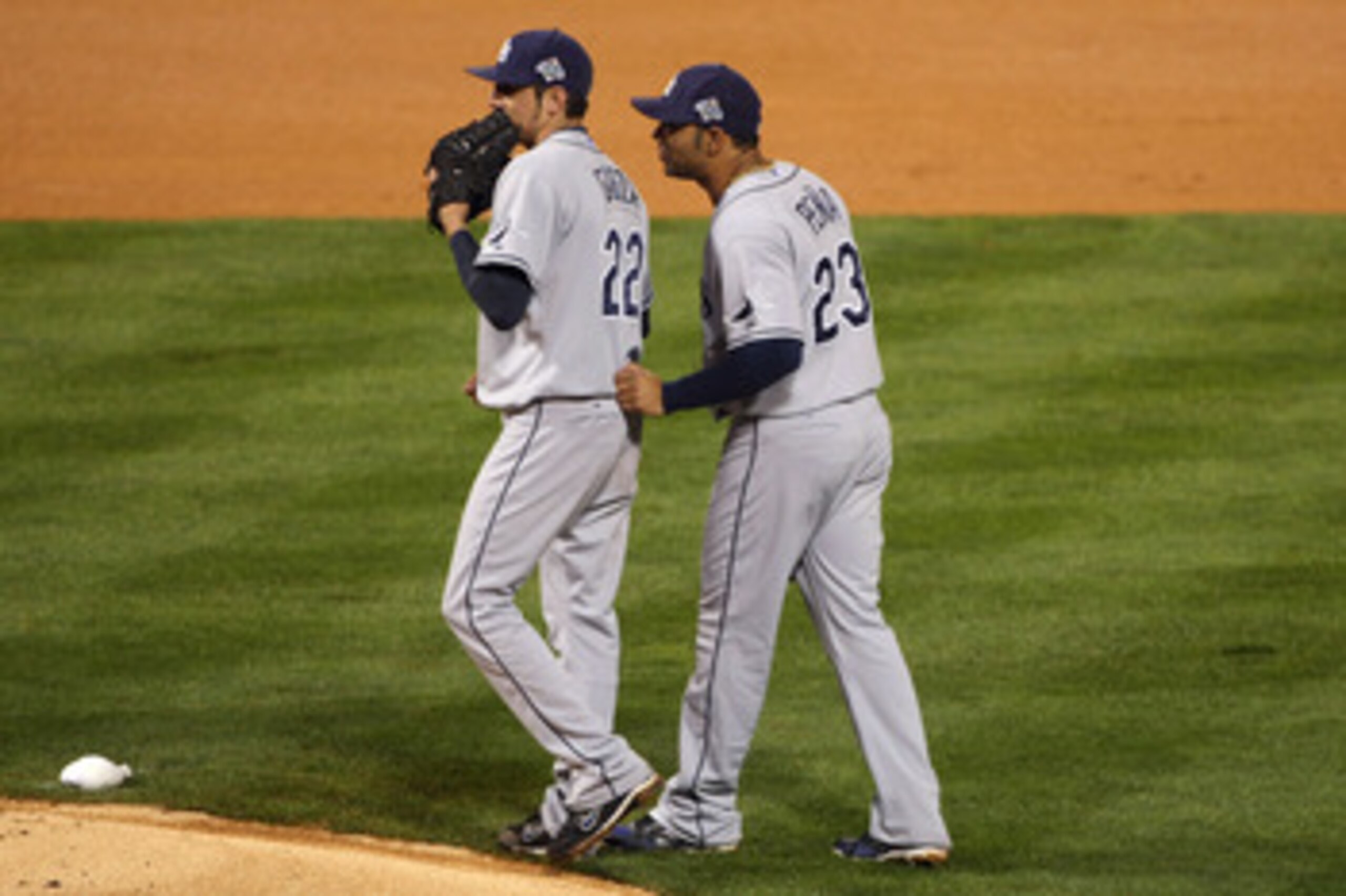 PHILADELPHIA - OCTOBER 25:  Carlos Pena #23 talks to Matt Garza #22 of the Tampa Bay Rays during game three of the 2008 MLB World Series against the Philadelphia Phillies on October 25, 2008 at Citizens Bank Park in Philadelphia, Pennsylvania.  (Photo by 
