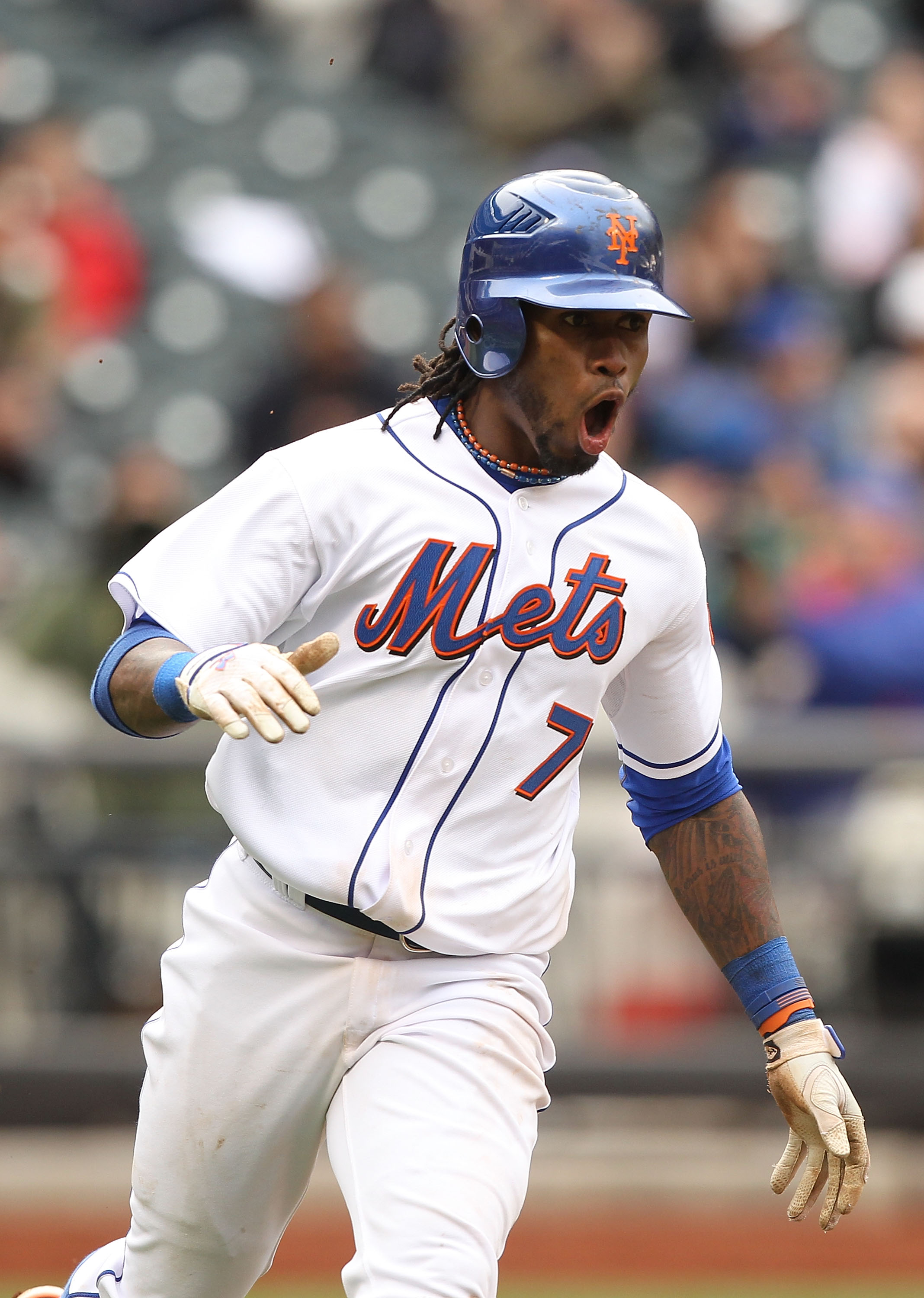 NEW YORK, NY - APRIL 10:  Jose Reyes #7 of the New York Mets reacts after hitting a single in the tenth inning against the Washington Nationals during their game on April 10, 2011 at Citi Field in the Flushing neighborhood of the Queens borough of New Yor