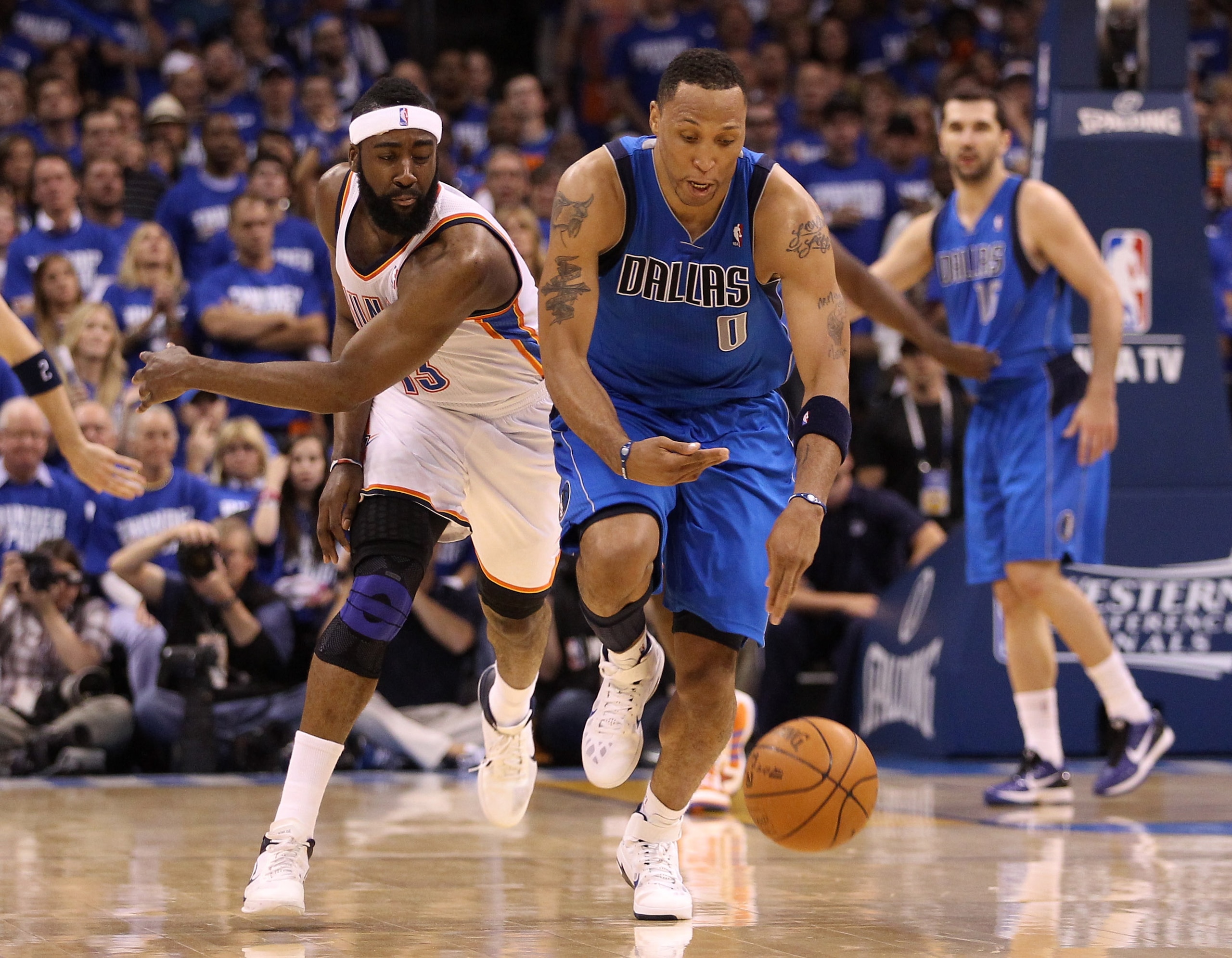 OKLAHOMA CITY, OK - MAY 21: Shawn Marion #0 of the Dallas Mavericks and James Harden #13 of the Oklahoma City Thunder go after the ball in Game Three of the Western Conference Finals during the 2011 NBA Playoffs at Oklahoma City Arena on May 21, 2011 in OKLAHOMA CITY, OK - MAY 21: Shawn Marion #0 of the Dallas Mavericks and James Harden #13 of the Oklahoma City Thunder go after the ball in Game Three of the Western Conference Finals during the 2011 NBA Playoffs at Oklahoma City Arena on May 21, 2011 in