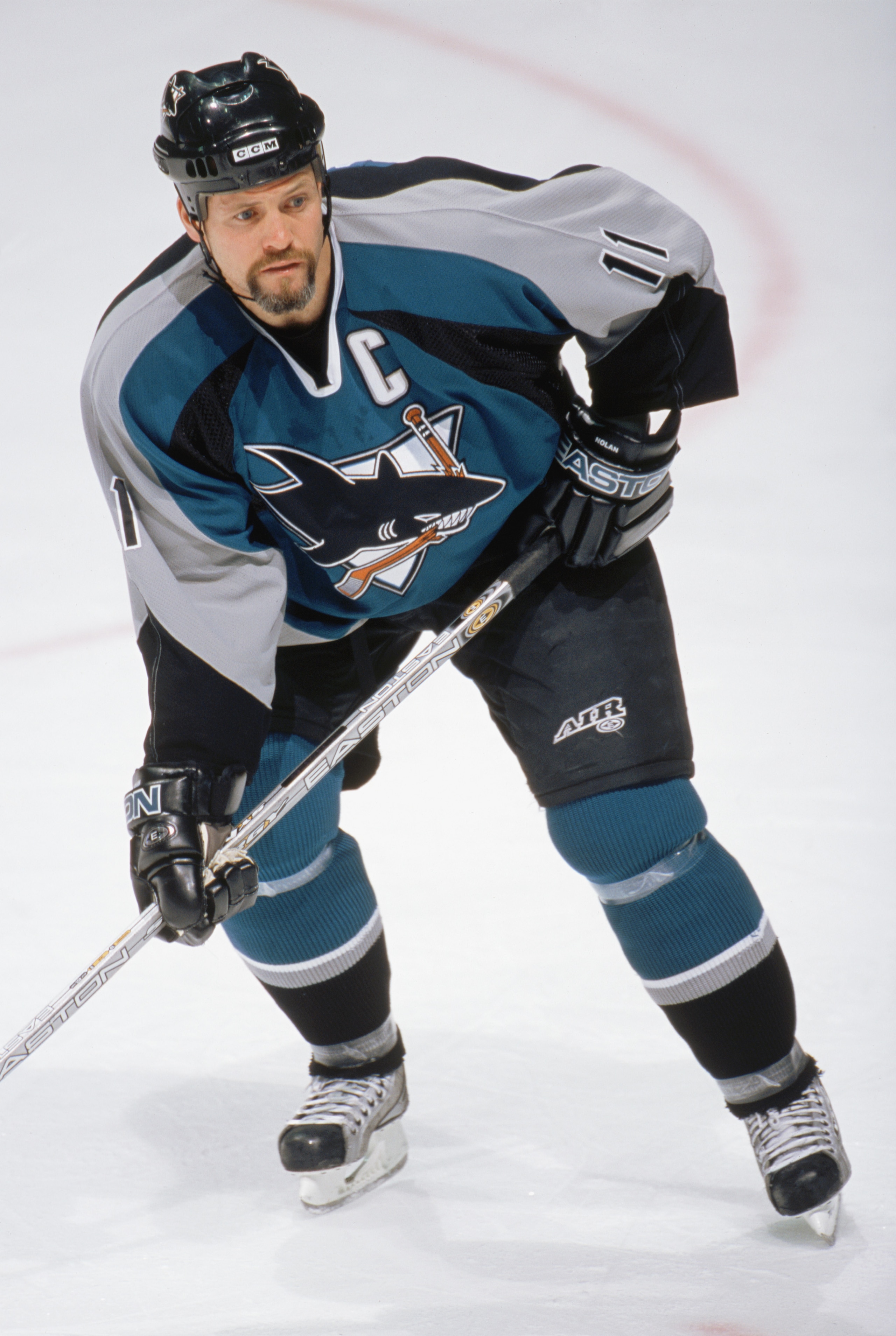 CALGARY - MARCH 1: Owen Nolan #11 of the San Jose Sharks skates during the NHL game against the Calgary Flames on March 1, 2003 at the Pengrowth Saddledome in Calgary, Canada. The Flames won 4-3. (Photo by: Ian Tomlinson/Getty Images/NHLI) CALGARY - MARCH 1: Owen Nolan #11 of the San Jose Sharks skates during the NHL game against the Calgary Flames on March 1, 2003 at the Pengrowth Saddledome in Calgary, Canada. The Flames won 4-3. (Photo by: Ian Tomlinson/Getty Images/NHLI)