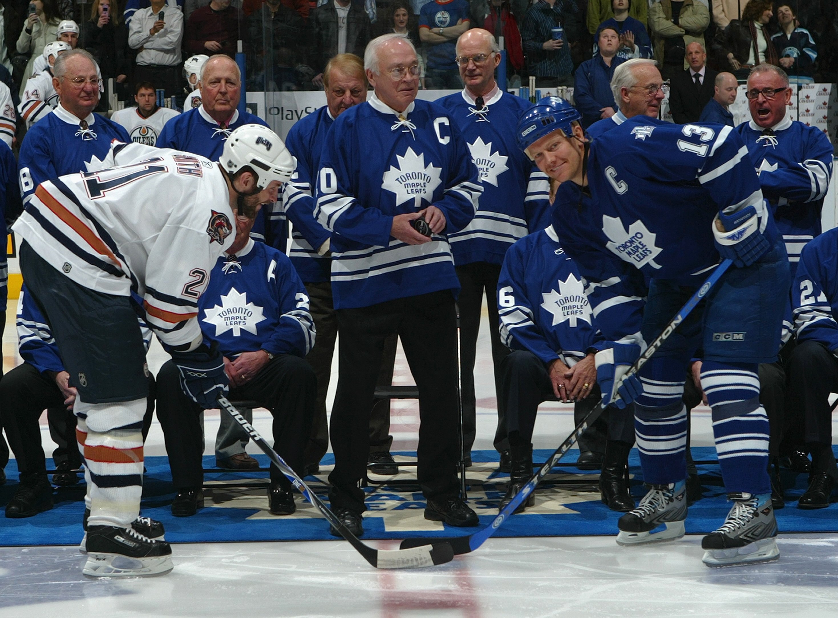 TORONTO - FEBRUARY 17:  George Armstrong drops the ceremonial opening faceoff to Jason Smith #21 of the Edmonton Oilers and Mats Sundin #13 of the Toronto Maple Leafs at Air Canada Centre on February 17, 2007 in Toronto, Ontario, Canada. The Maple Leafs h