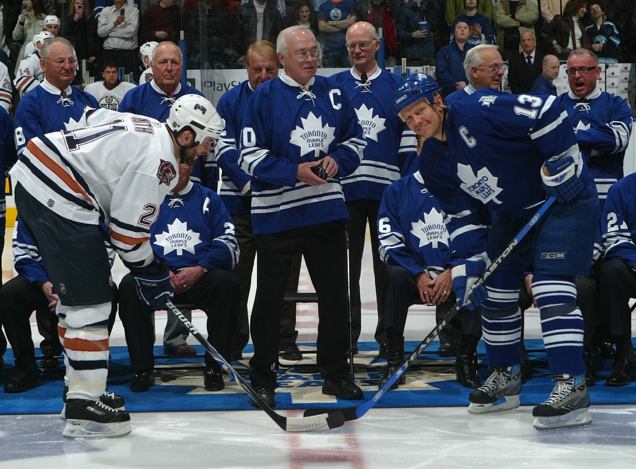 TORONTO - FEBRUARY 17: George Armstrong drops the ceremonial opening faceoff to Jason Smith #21 of the Edmonton Oilers and Mats Sundin #13 of the Toronto Maple Leafs at Air Canada Centre on February 17, 2007 in Toronto, Ontario, Canada. The Maple Leafs h TORONTO - FEBRUARY 17: George Armstrong drops the ceremonial opening faceoff to Jason Smith #21 of the Edmonton Oilers and Mats Sundin #13 of the Toronto Maple Leafs at Air Canada Centre on February 17, 2007 in Toronto, Ontario, Canada. The Maple Leafs h