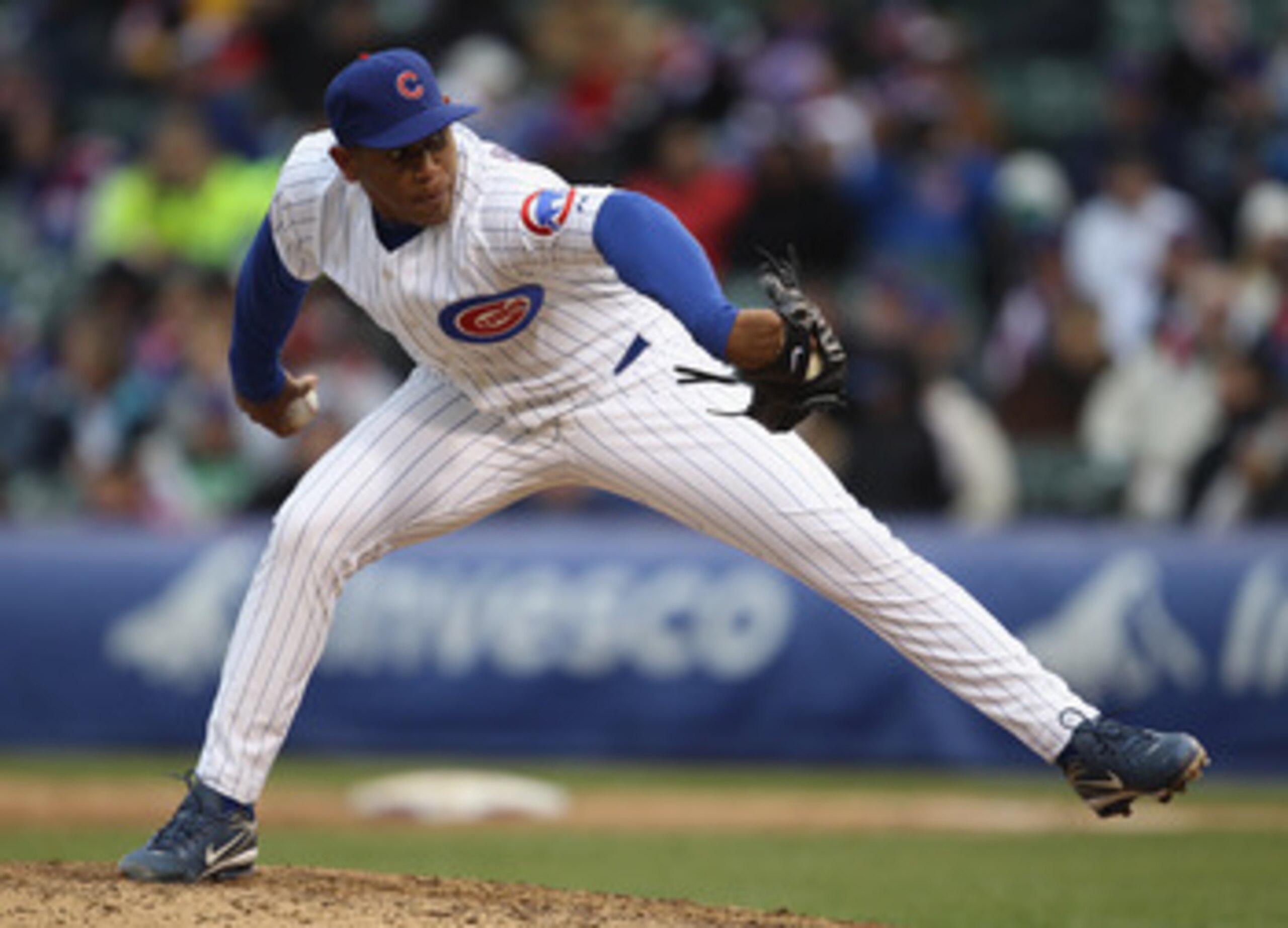 CHICAGO, IL - APRIL 20: Carlos Marmol #49 of the Chicago Cubs pitches in the 9th inning against the San Diego Padres at Wrigley Field on April 20, 2011 in Chicago, Illinois. The Cubs defeated the Padres 2-1 in 11 innings. (Photo by Jonathan Daniel/Getty I