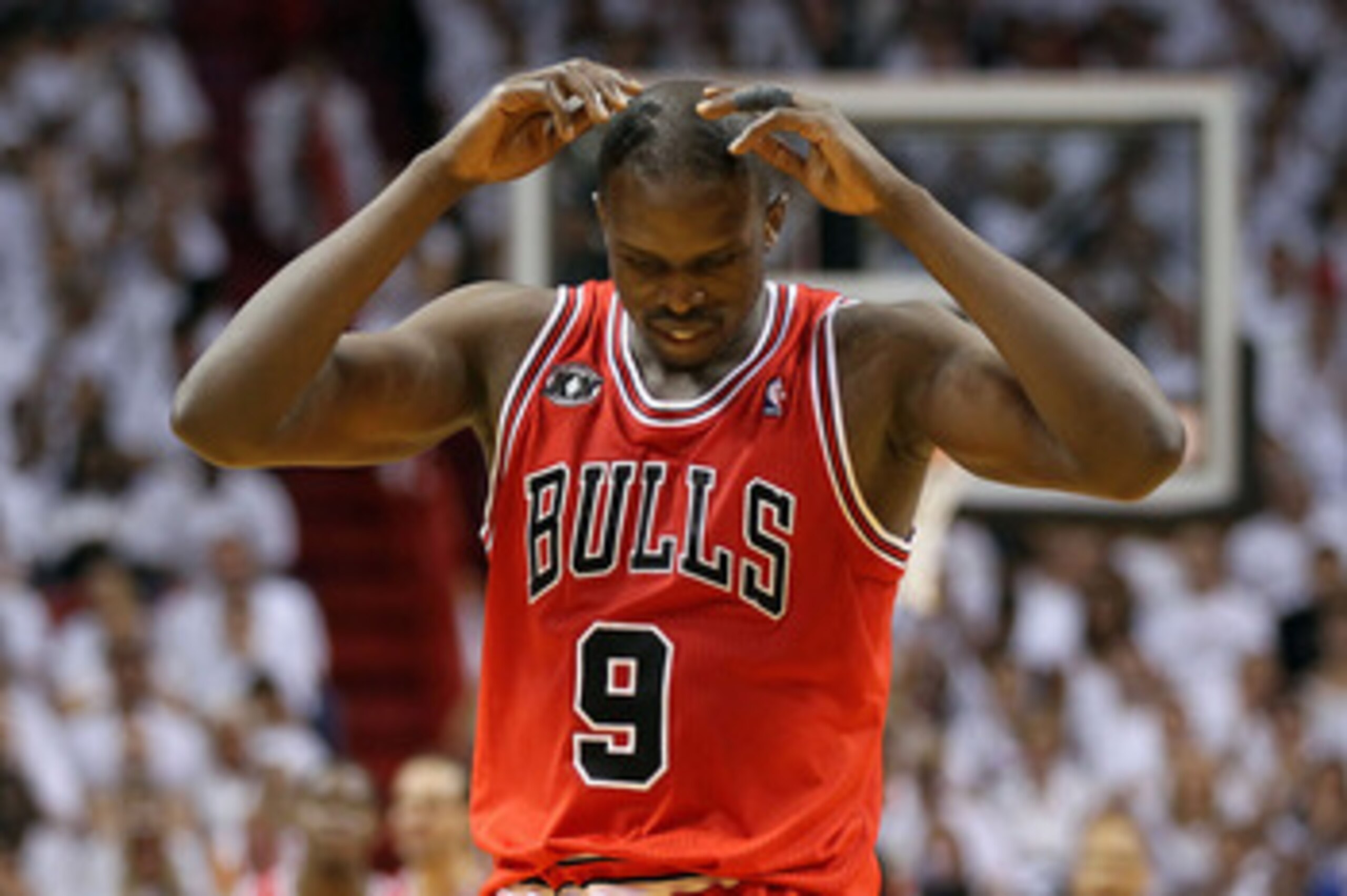 MIAMI, FL - MAY 22: Luol Deng #9 of the Chicago Bulls walks up court with his head down against the Miami Heat in Game Three of the Eastern Conference Finals during the 2011 NBA Playoffs on May 22, 2011 at American Airlines Arena in Miami, Florida. NOTE MIAMI, FL - MAY 22: Luol Deng #9 of the Chicago Bulls walks up court with his head down against the Miami Heat in Game Three of the Eastern Conference Finals during the 2011 NBA Playoffs on May 22, 2011 at American Airlines Arena in Miami, Florida. NOTE