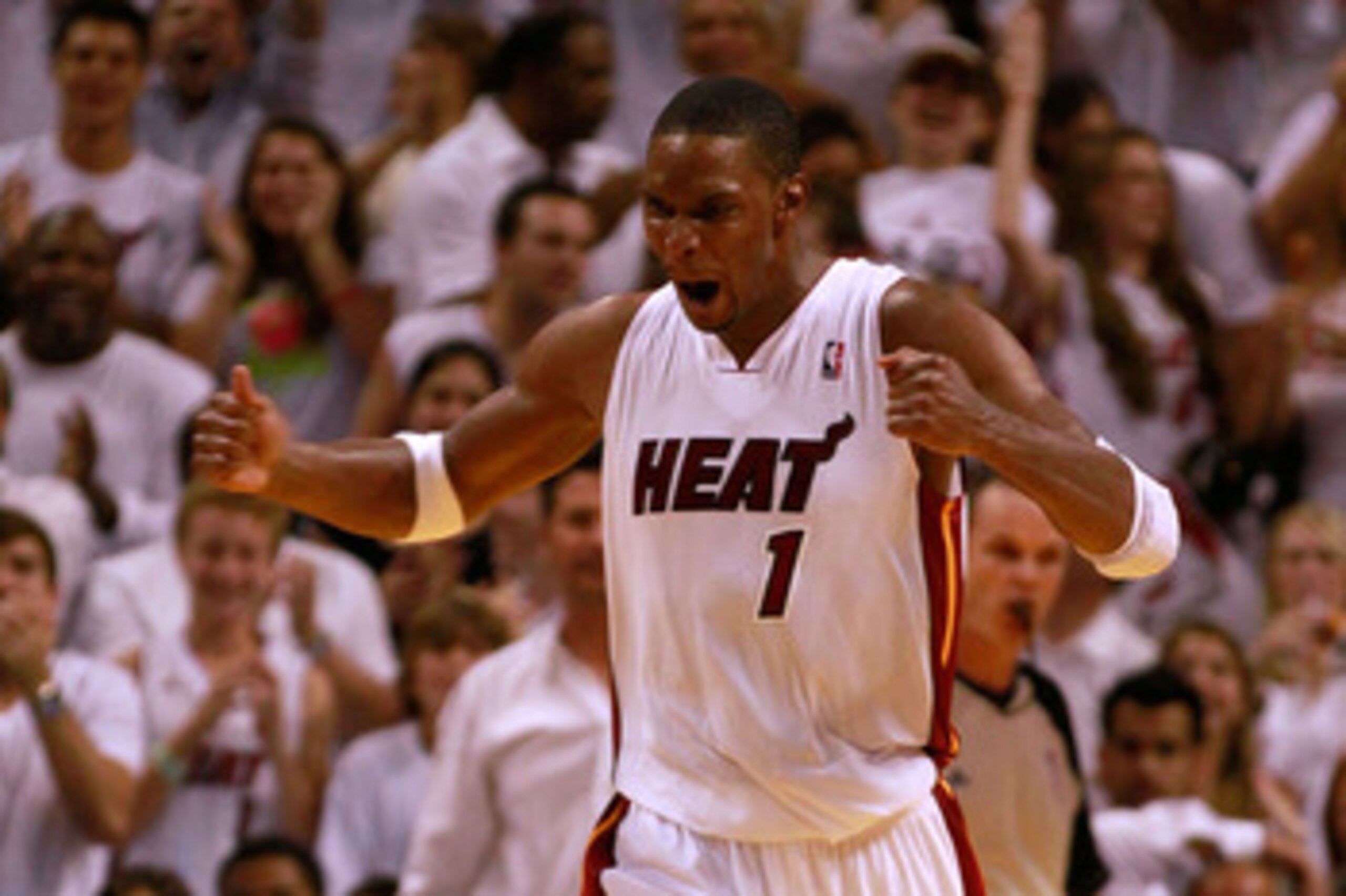 MIAMI, FL - MAY 22: Chris Bosh #1 of the Miami Heat reacts in the fourth quarter against the Chicago Bulls in Game Three of the Eastern Conference Finals during the 2011 NBA Playoffs on May 22, 2011 at American Airlines Arena in Miami, Florida. NOTE TO MIAMI, FL - MAY 22: Chris Bosh #1 of the Miami Heat reacts in the fourth quarter against the Chicago Bulls in Game Three of the Eastern Conference Finals during the 2011 NBA Playoffs on May 22, 2011 at American Airlines Arena in Miami, Florida. NOTE TO