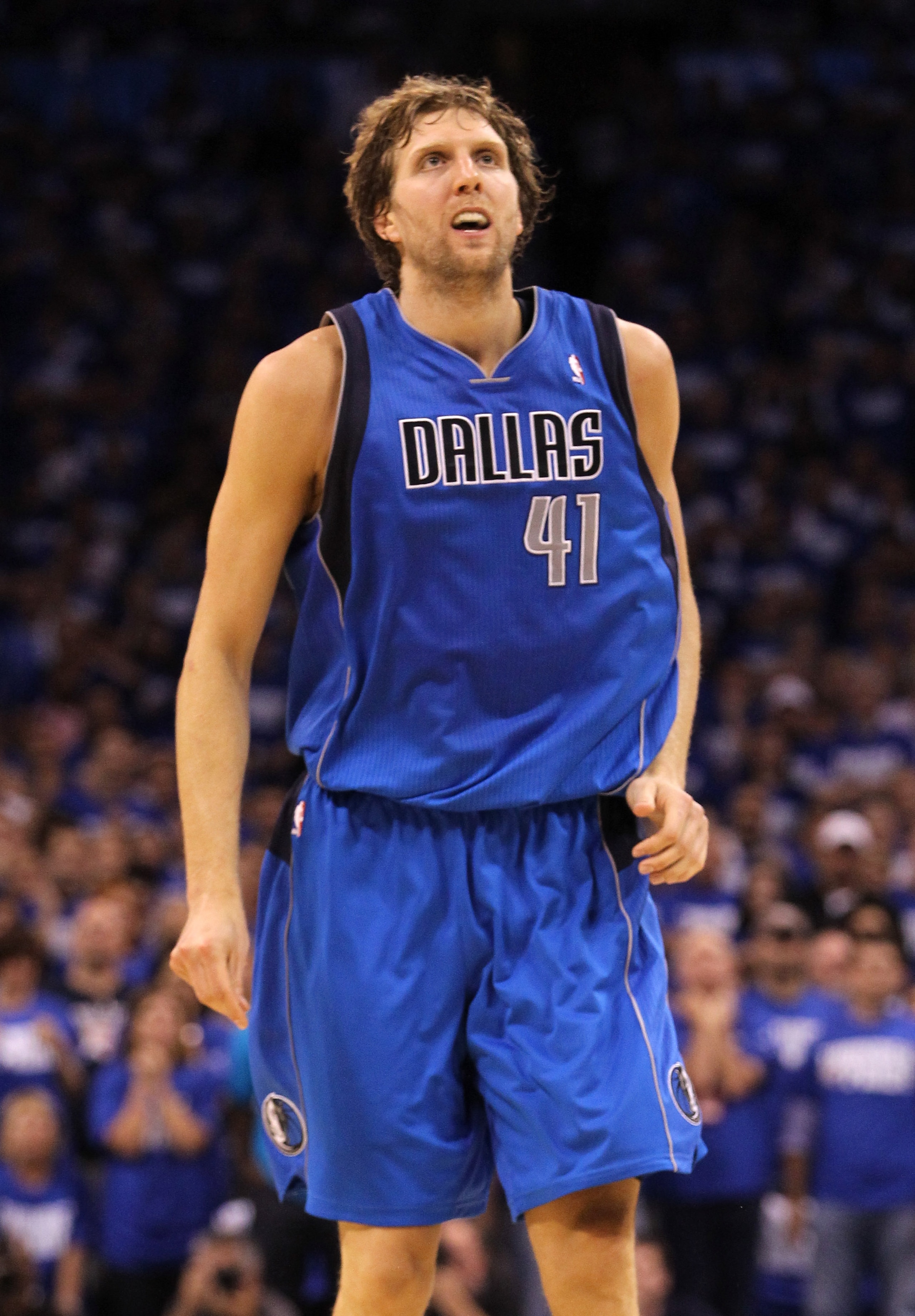 OKLAHOMA CITY, OK - MAY 21: Dirk Nowitzki #41 of the Dallas Mavericks looks on while taking on the Oklahoma City Thunder in Game Three of the Western Conference Finals during the 2011 NBA Playoffs at Oklahoma City Arena on May 21, 2011 in Oklahoma City, OKLAHOMA CITY, OK - MAY 21: Dirk Nowitzki #41 of the Dallas Mavericks looks on while taking on the Oklahoma City Thunder in Game Three of the Western Conference Finals during the 2011 NBA Playoffs at Oklahoma City Arena on May 21, 2011 in Oklahoma City,