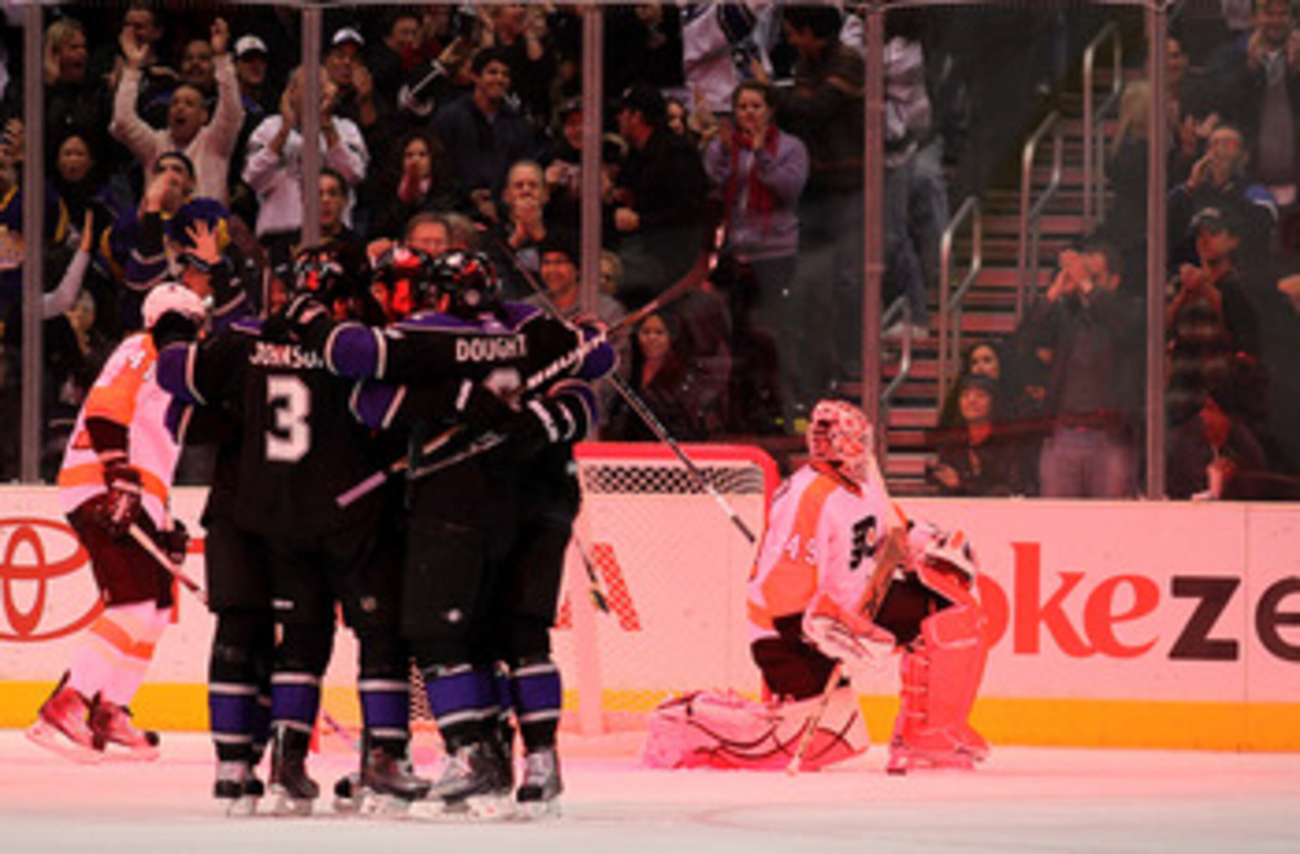 LOS ANGELES, CA - DECEMBER 30:  Goaltender Michael Leighton #49 of the Philadelphia Flyers reacts after giving up his second goal as the Los Angeles Kings celebrate at Staples Center on December 30, 2010 in Los Angeles, California.   (Photo by Stephen Dun