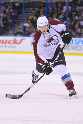 ST. LOUIS, MO - APRIL 5: Erik Johnson #6 of the Colorado Avalanche takes a shot on goal against the St. Louis Blues at the Scottrade Center on April 5, 2011 in St. Louis, Missouri.  (Photo by Dilip Vishwanat/Getty Images)