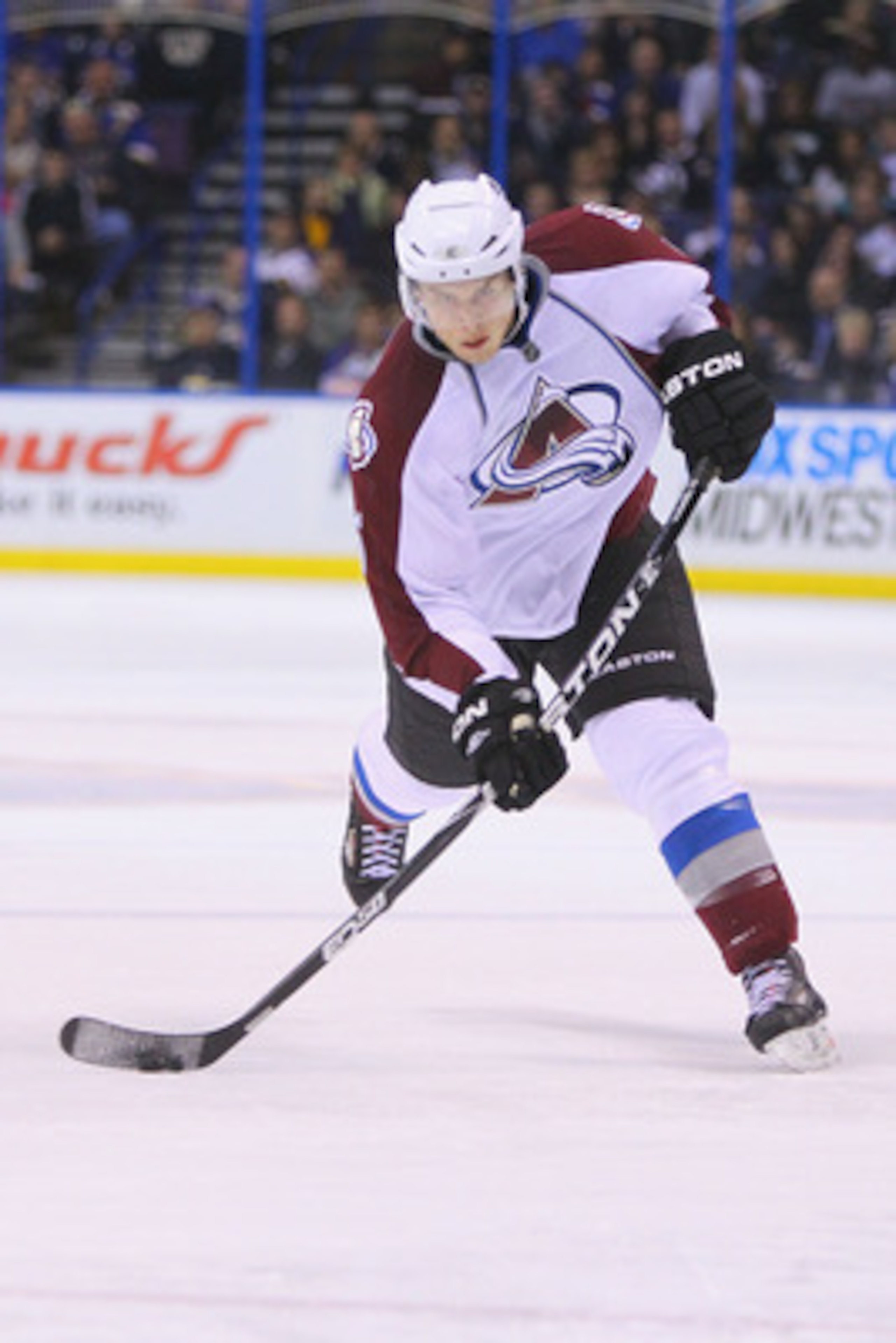 ST. LOUIS, MO - APRIL 5: Erik Johnson #6 of the Colorado Avalanche takes a shot on goal against the St. Louis Blues at the Scottrade Center on April 5, 2011 in St. Louis, Missouri.  (Photo by Dilip Vishwanat/Getty Images)