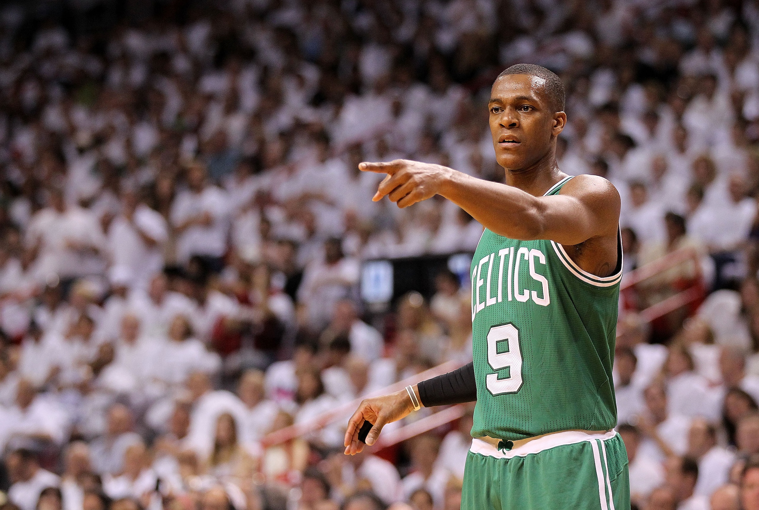 MIAMI, FL - MAY 01:  Rajon Rondo #9  of the Boston Celtics points during Game One of the Eastern Conference Semifinals of the 2011 NBA Playoffs against the Miami Heat at American Airlines Arena on May 1, 2011 in Miami, Florida. NOTE TO USER: User expressl