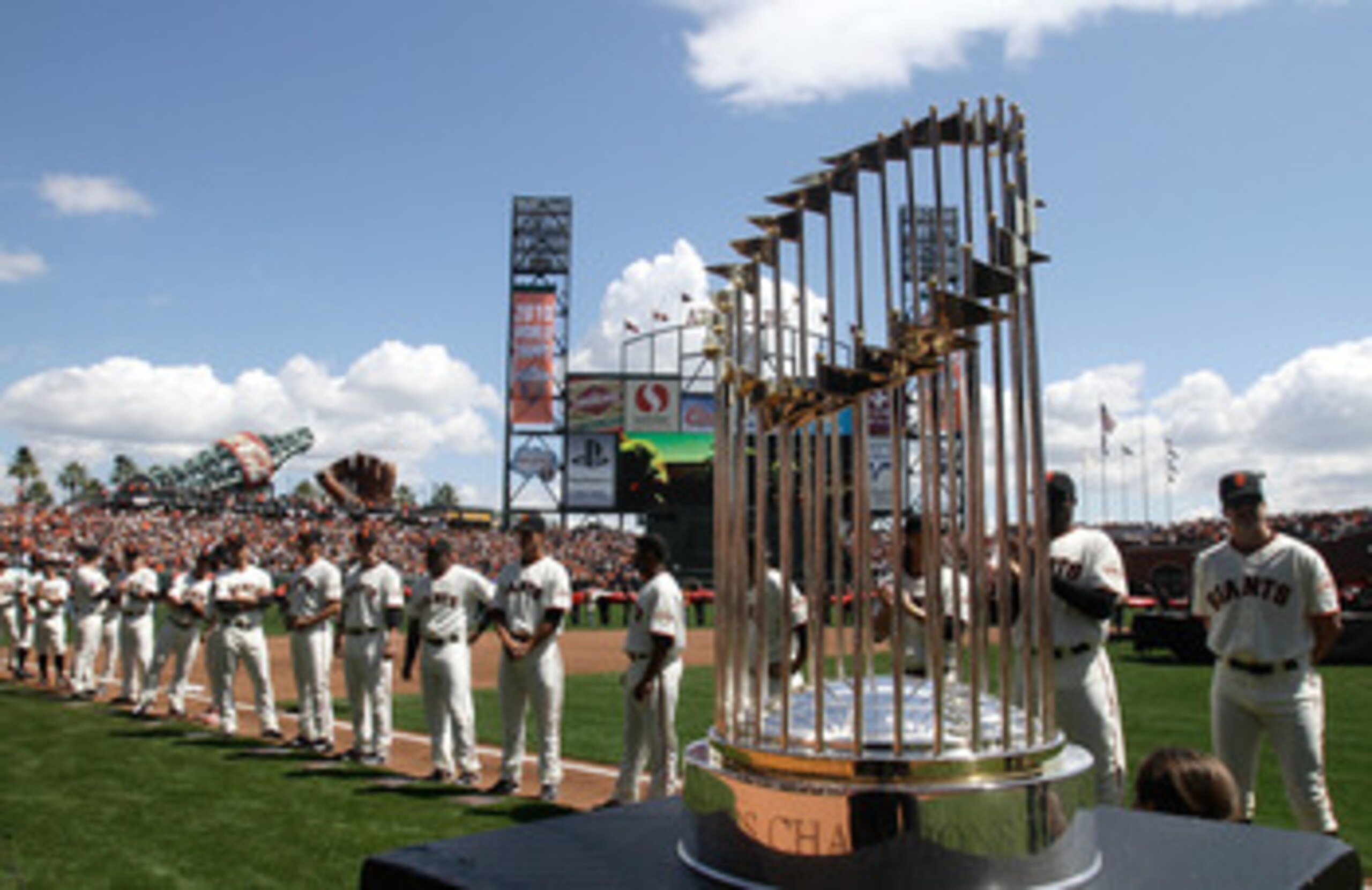 SAN FRANCISCO, CA - APRIL 08: The 2010 World Series trophy is displayed as San Francisco Giants players line up before the start of the Giants' opening day game against the St. Louis Cardinals at AT&T Park on April 8, 2011 in San Francisco, California. SAN FRANCISCO, CA - APRIL 08: The 2010 World Series trophy is displayed as San Francisco Giants players line up before the start of the Giants' opening day game against the St. Louis Cardinals at AT&T Park on April 8, 2011 in San Francisco, California.