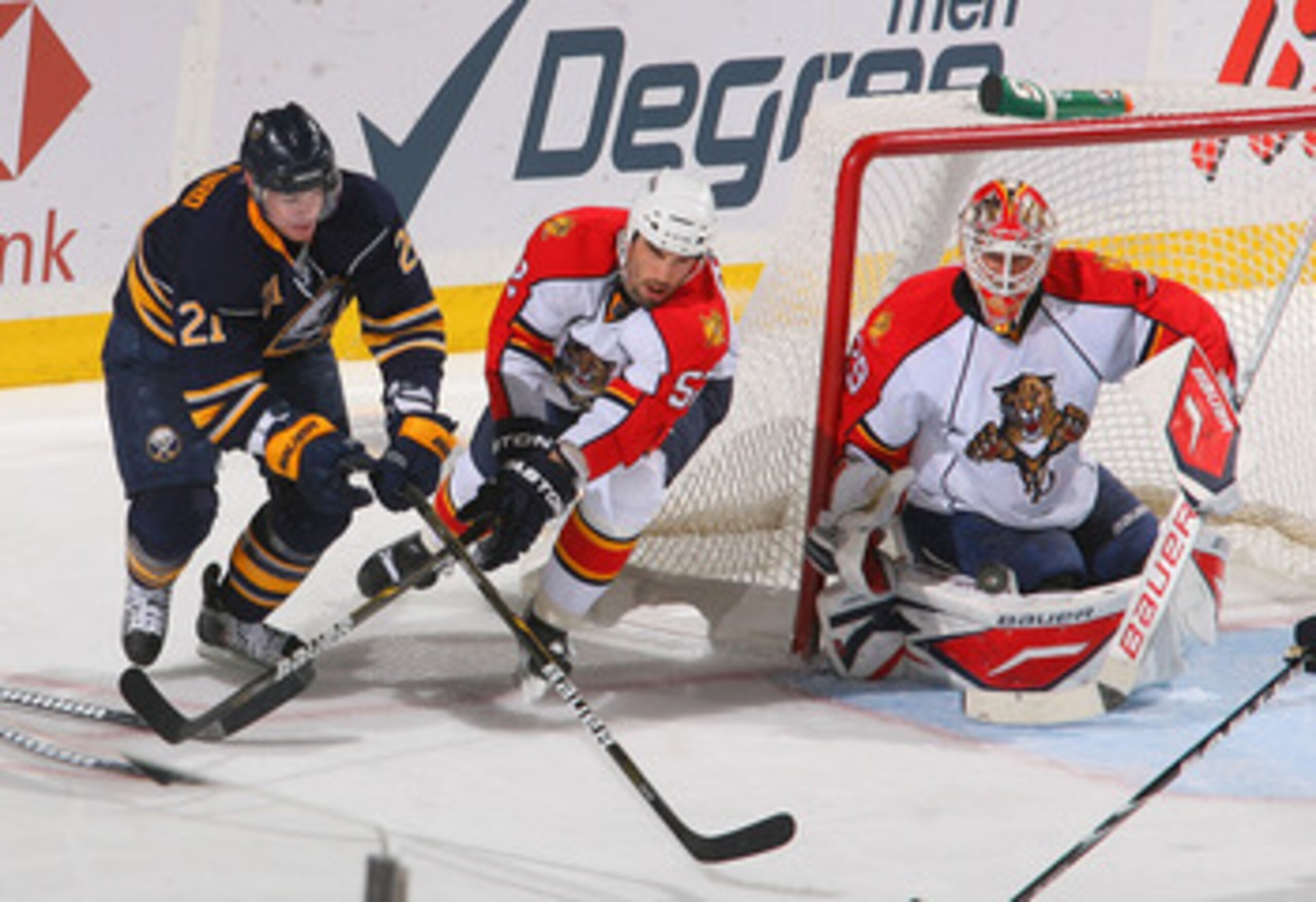 BUFFALO, NY - MARCH 25: Tomas Vokoun #29 and Jason Garrison #52 of the Florida Panthers defend against Drew Stafford #21 of the Buffalo Sabres at HSBC Arena on March 25, 2011 in Buffalo, New York.  (Photo by Rick Stewart/Getty Images)
