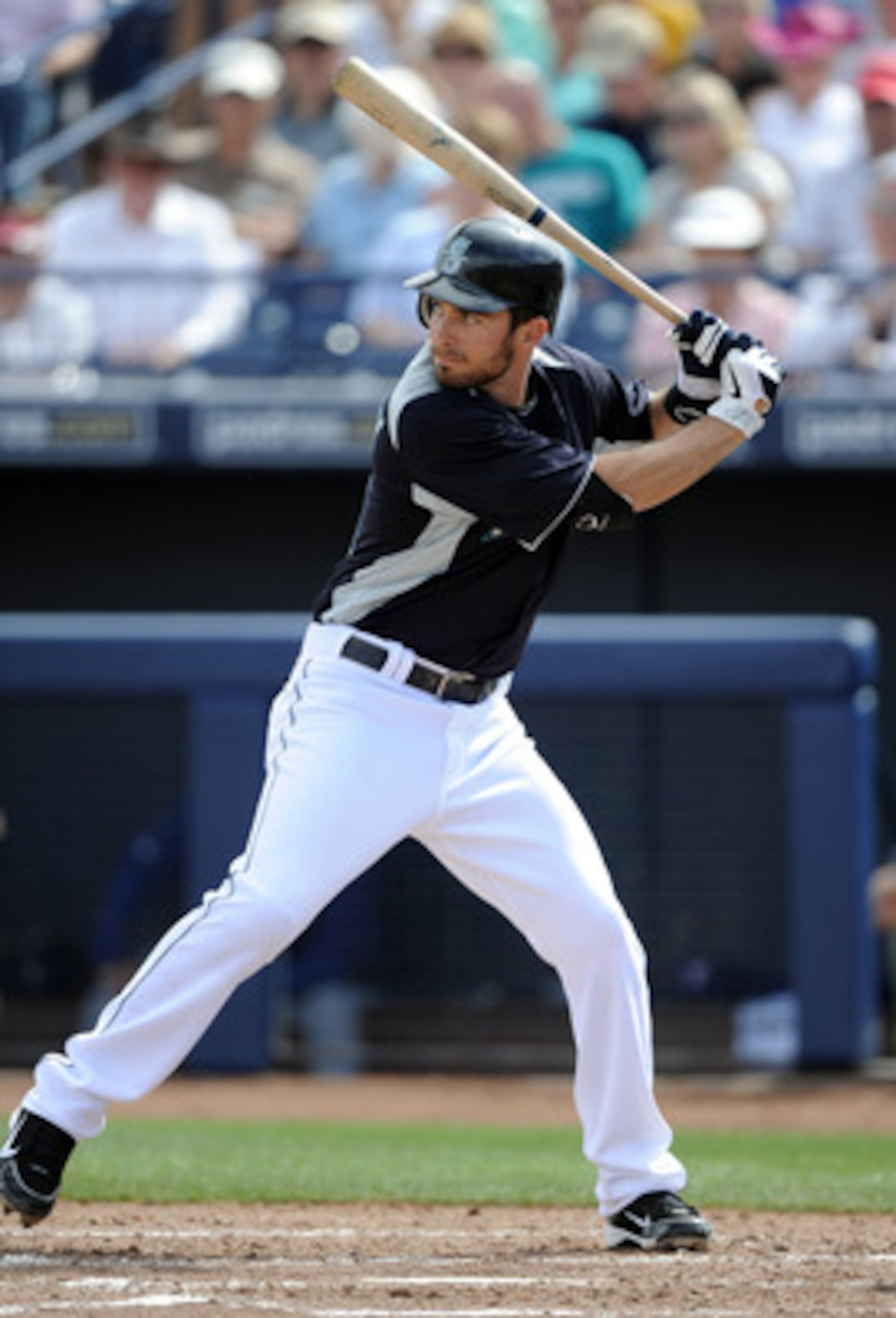 PEORIA, AZ - MARCH 01:  Dustin Ackley #13 of the  Seattle Mariners at bat against the Texas Rangers during spring training at Peoria Stadium on March 1, 2011 in Peoria, Arizona.  (Photo by Harry How/Getty Images)