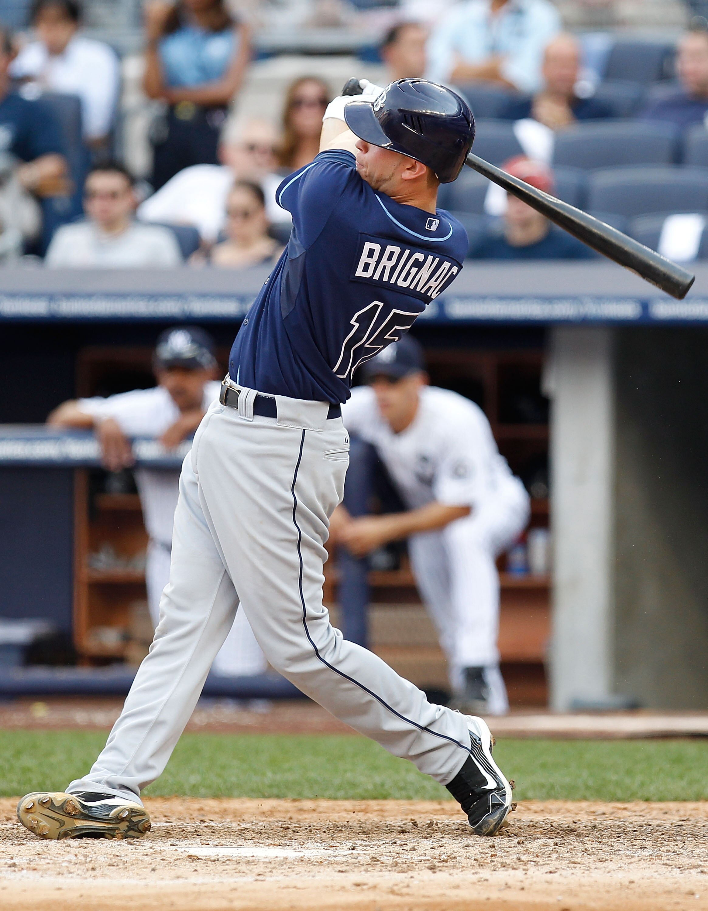 NEW YORK - JULY 17:  Reid Brignac #15 of the Tampa Bay Rays hits his second home run of the game against the New York Yankees on July 17, 2010 at Yankee Stadium in the Bronx borough of New York City.  (Photo by Mike Stobe/Getty Images)