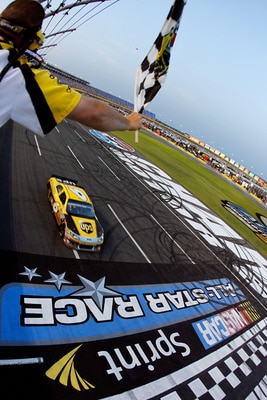 CHARLOTTE, NC - MAY 21:  David Ragan, driver of the #6 UPS Ford, comes to the finish line to win the NASCAR Sprint Showdown at Charlotte Motor Speedway on May 21, 2011 in Charlotte, North Carolina.  (Photo by Pool/Getty Images for NASCAR)