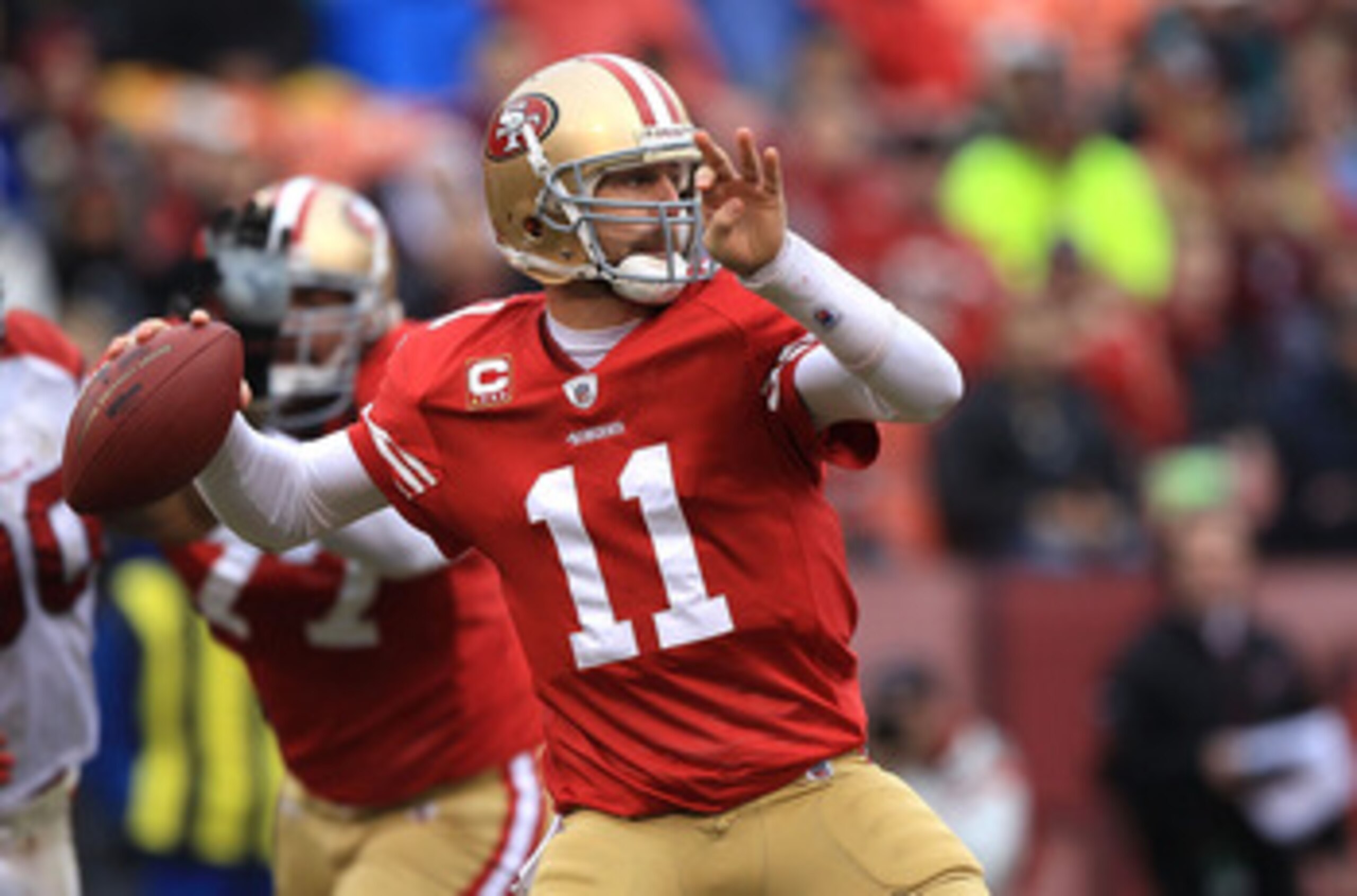 SAN FRANCISCO, CA - JANUARY 2:  Alex Smith #11 of the San Francisco 49ers passes against the Arizona Cardinals during an NFL game at Candlestick Park on January 2, 2011 in San Francisco, California.(Photo by Jed Jacobsohn/Getty Images)