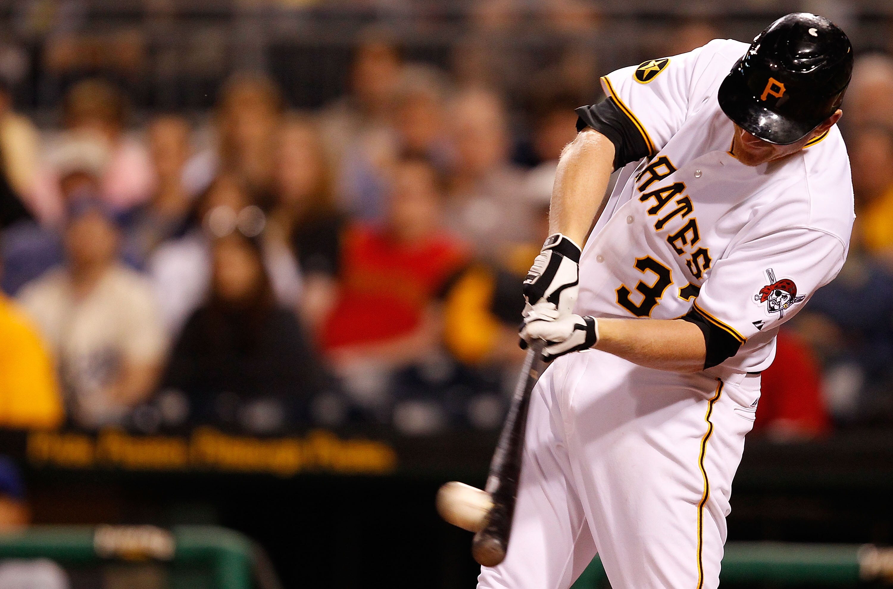 PITTSBURGH - MAY 09: Lyle Overbay #37 of the Pittsburgh Pirates hits an RBI double in the 8th inning against the Los Angeles Dodgers during the game on May 9, 2011 at PNC Park in Pittsburgh, Pennsylvania.  (Photo by Jared Wickerham/Getty Images)
