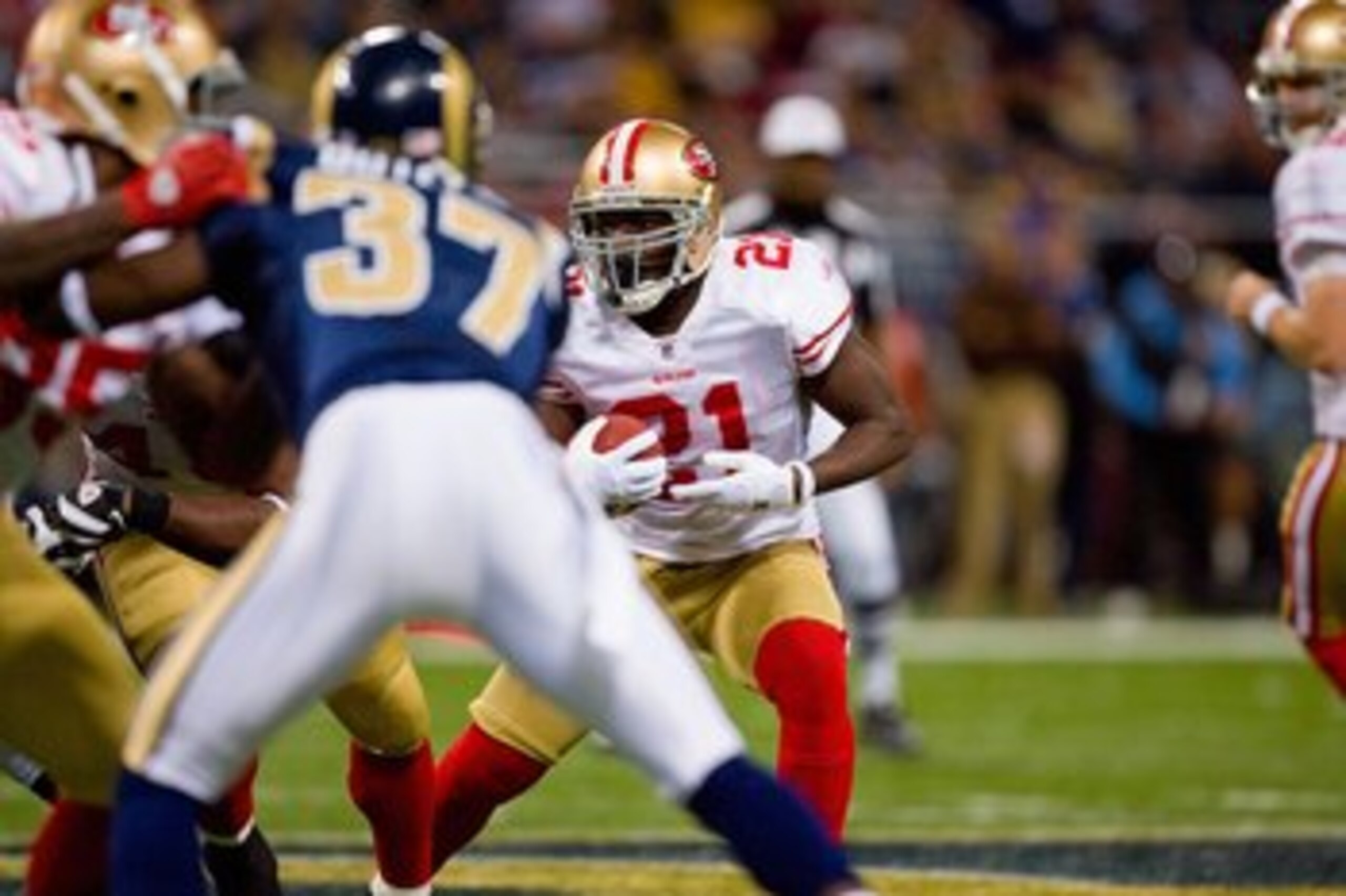 ST. LOUIS - JANUARY 3:  Frank Gore #21 of the San Francisco 49ers carries the ball during the game against the St. Louis Rams at the Edward Jones Dome on January 3, 2010 in St. Louis, Missouri.  The 49ers beat the Rams 28-6.  (Photo by Dilip Vishwanat/Get