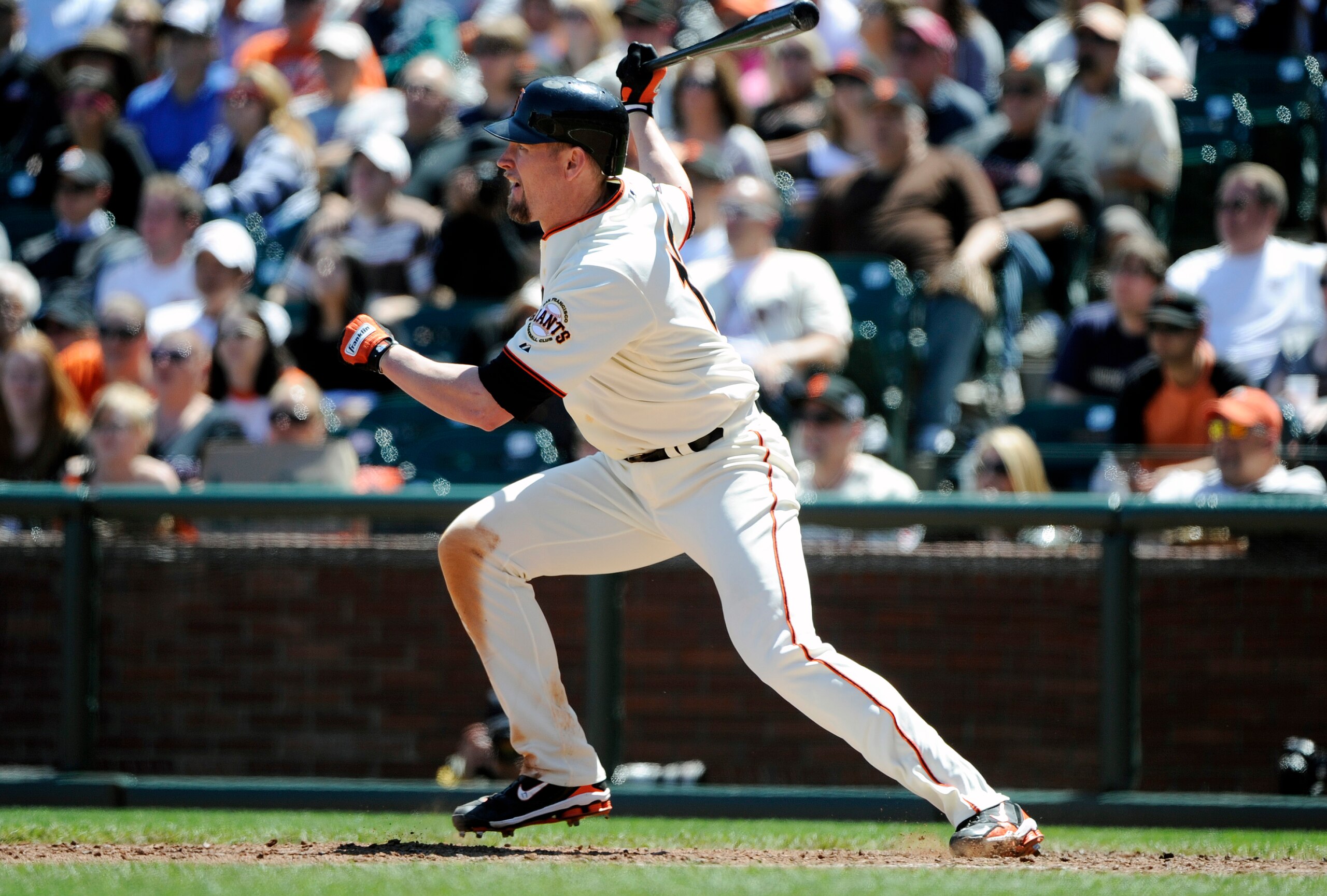 SAN FRANCISCO, CA - MAY 12: Aubrey Huff #17 of the San Francisco Giants hits an RBI single driving in Andres Torres in the bottom of the seventh inning against the Arizona Diamondbacks during a MLB baseball game at AT&T Park May 12, 2011 in San Francisco,