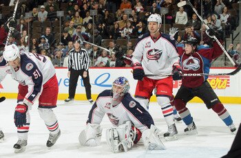 DENVER, CO - MARCH 22:  Goalie Steve Mason #1 of the Columbus Blue Jackets reacts and Matt Duchene #9 of the Colorado Avalanche celebrates after a shot by Daniel Winnik of the Colorado Avalanche scores with three seconds left in the game to tie the score 