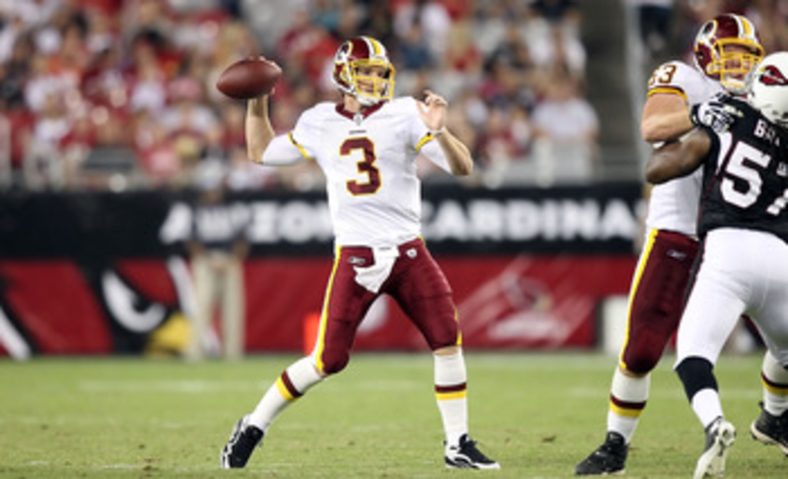 GLENDALE, AZ - SEPTEMBER 02:  Quarterback John Beck #3 of the Washington Redskins drops back to pass during preseason NFL game against the Arizona Cardinals at the University of Phoenix Stadium on September 2, 2010 in Glendale, Arizona. The Cardinals defe